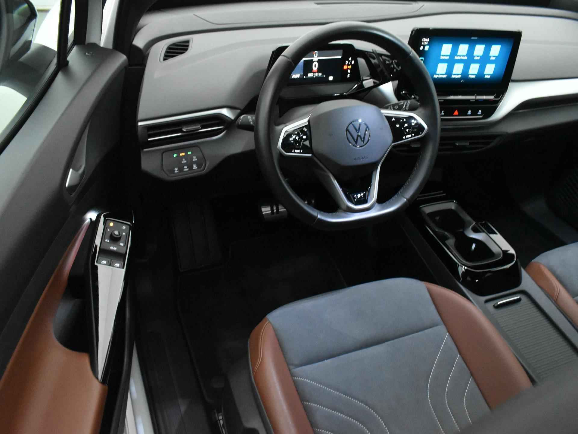 Volkswagen ID.4 First 77 kWh 204 PK [ Automaat | Warmtepomp | Navigatie | Apple carplay | Android auto | Parkeersensoren | Camera | Lichtmetalen velgen | Adaptive cruise control | Climate control | Stoelverwarming | Stuurverwarming | - 7/23