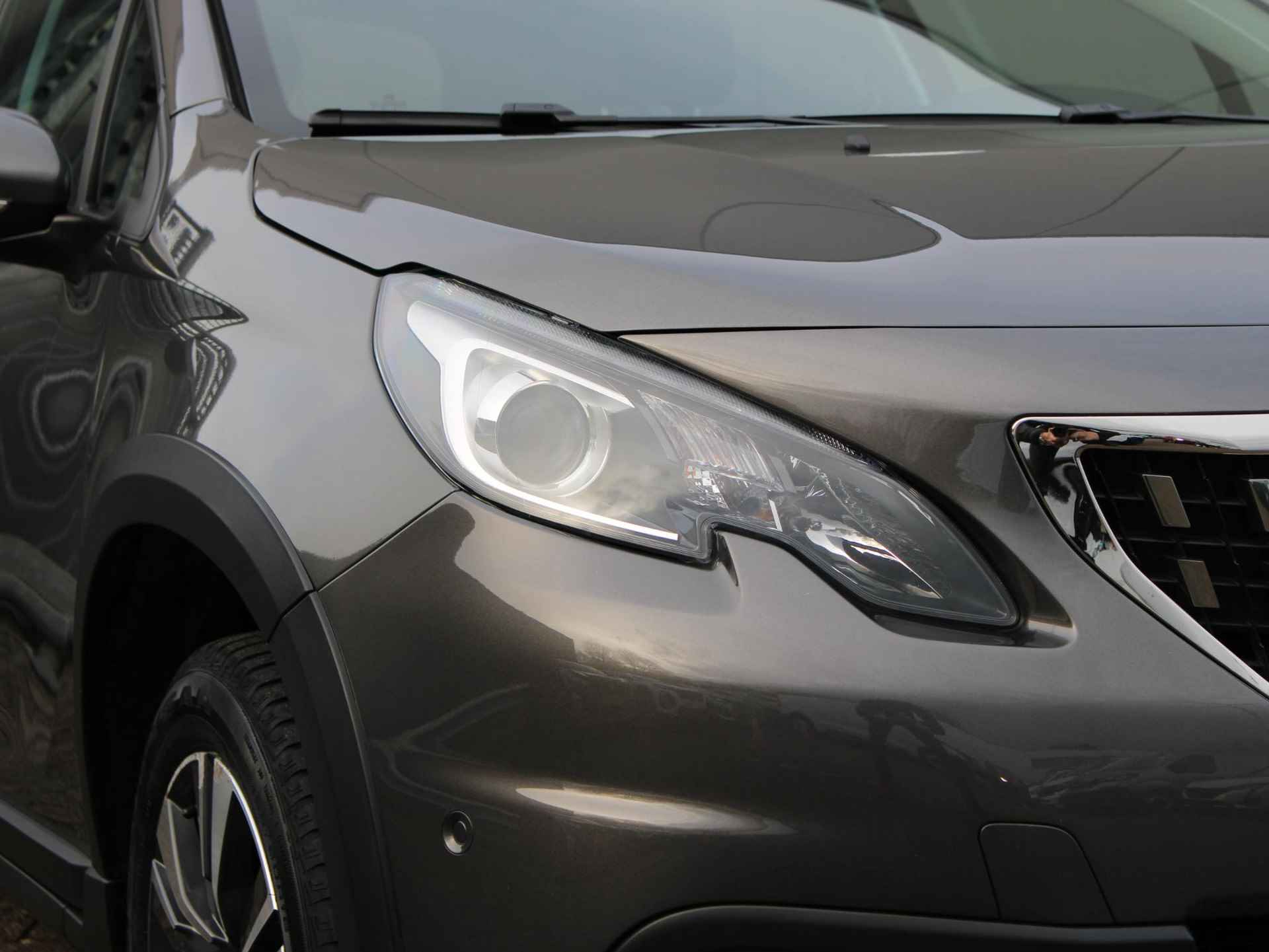 Peugeot 2008 1.2 PureTech Allure Automaat | Navi / Panoramadak / Camera - 24/26