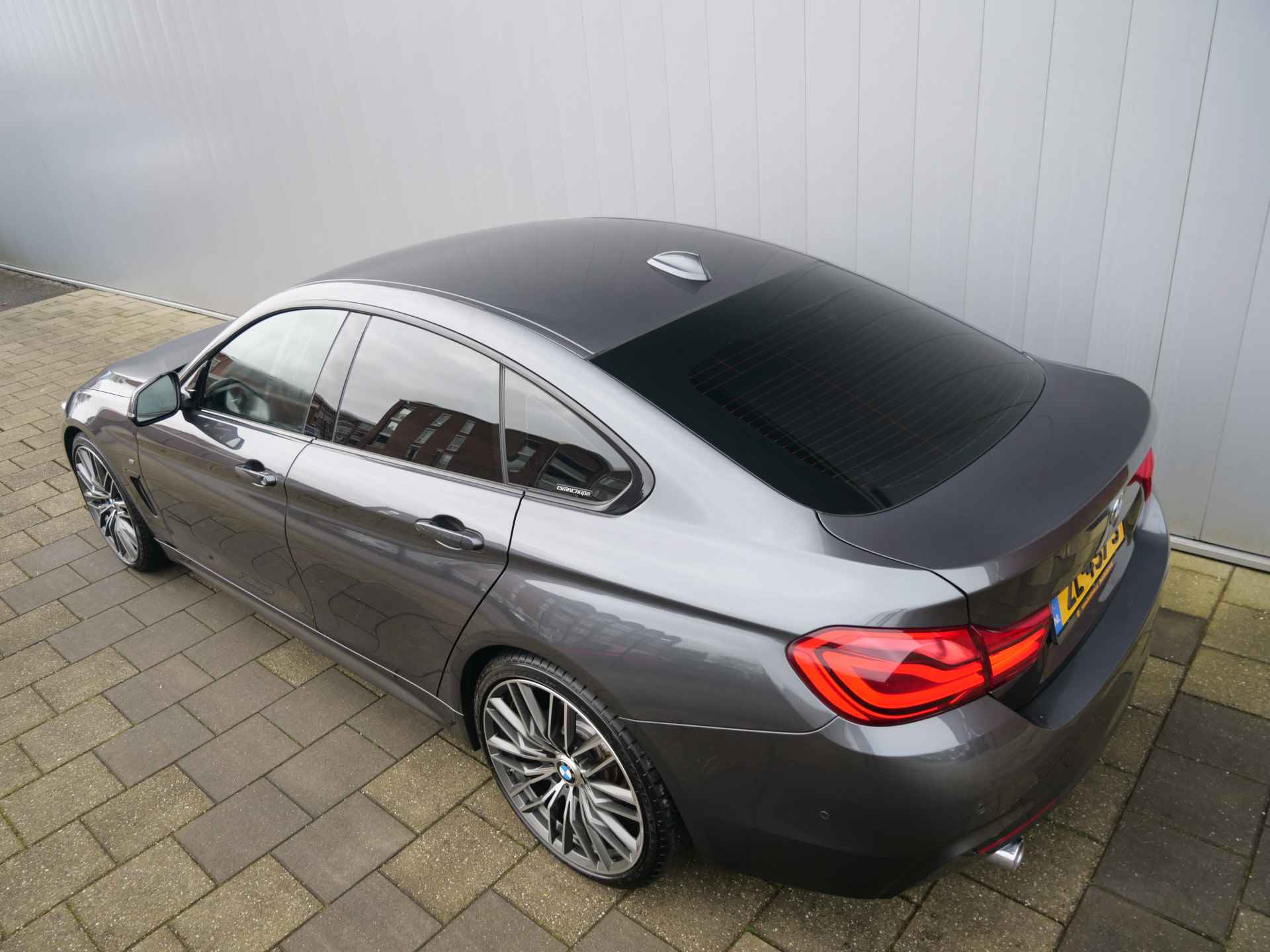 BMW 4 Serie Gran Coupé 418i 136pk High Executive Automaat M-pakket 20 Inch / Leer / Camera / Extra getint glas - 31/37