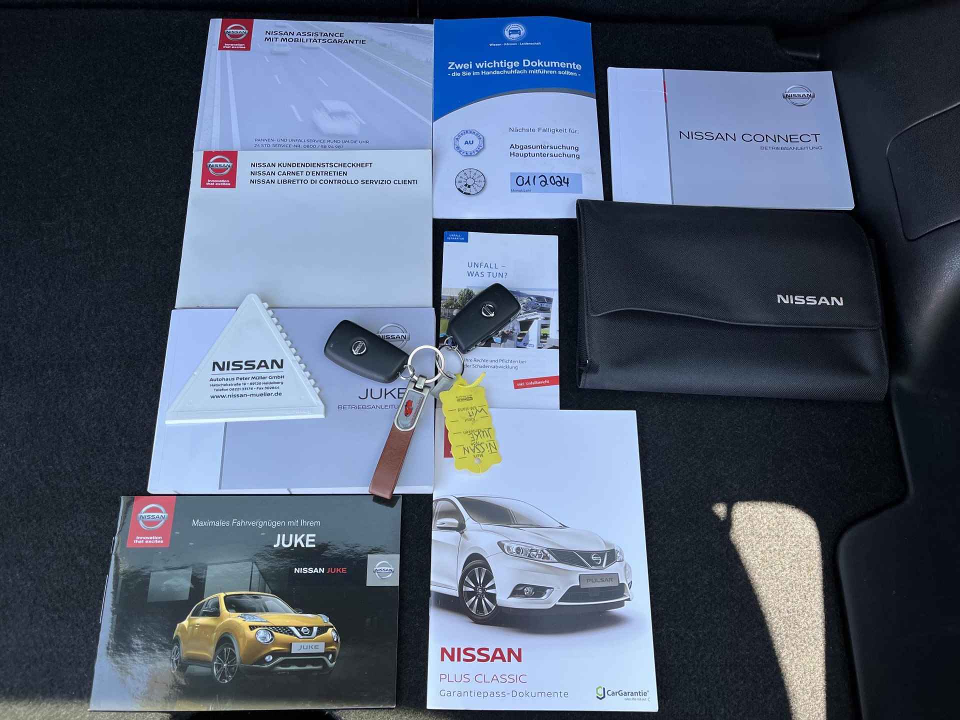 Nissan Juke 1.2 DIG-T S/S N-Connecta Climate Control, Apple Carplay, Stoelverwarming, Zwarte hemel, 17" Lichtmetalen velgen, Achteruitrijcamera, Multifunctioneel stuurwiel, Navigatiesysteem (MET GARANTIE*) - 27/28