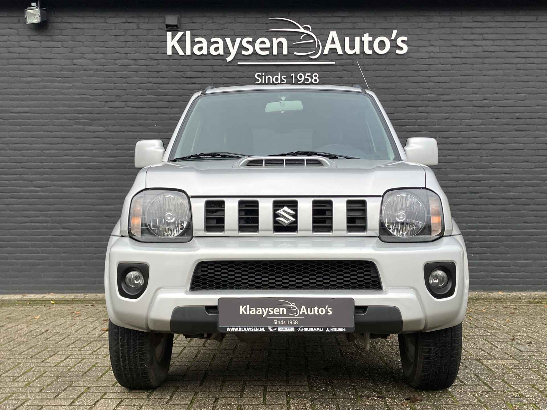 Suzuki Jimny 1.3 Exclusive 4WD | dealer onderhouden | airco | leder interieur | trekhaak | stoelverwarming | dakrails - 3/29