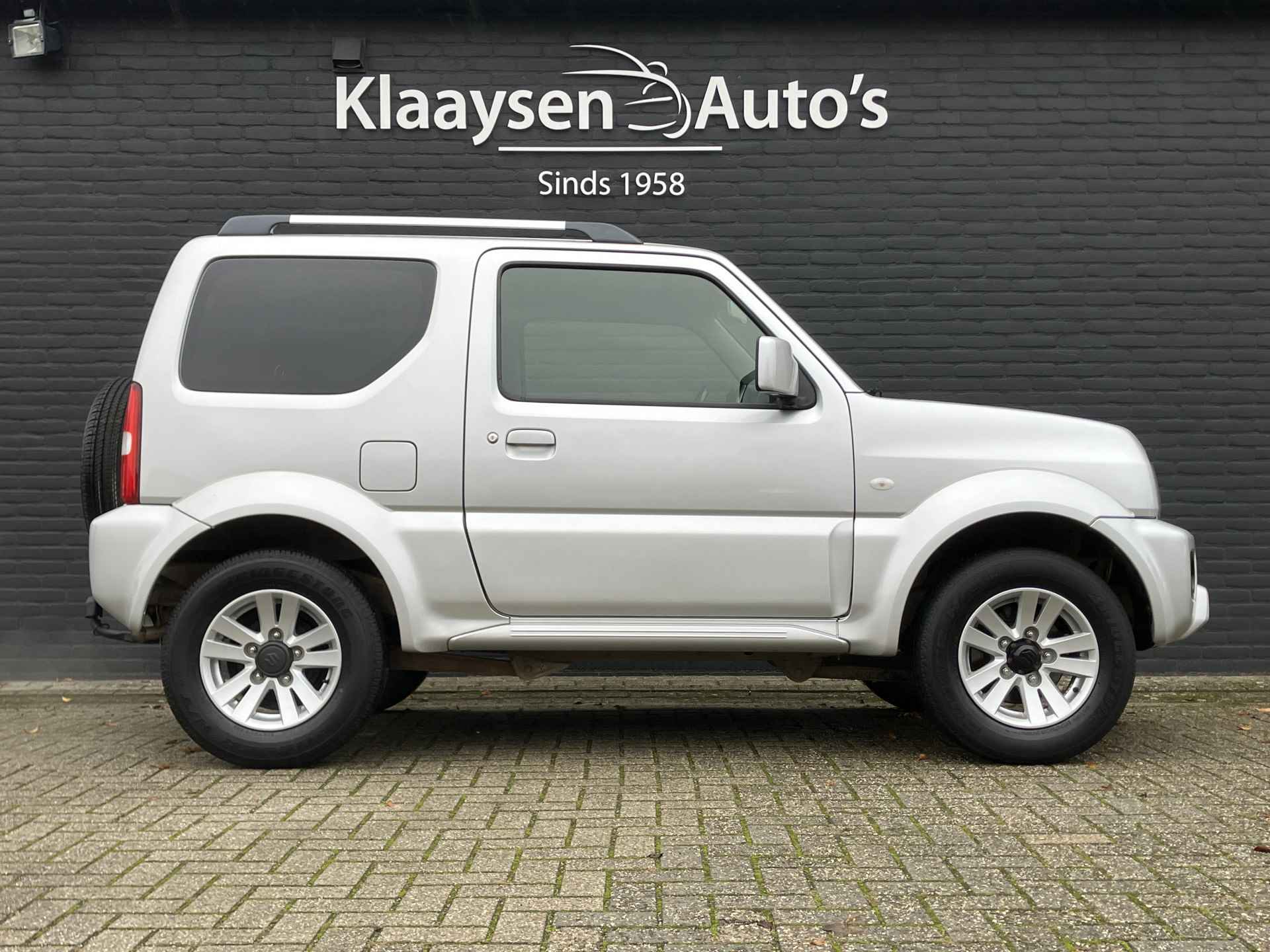 Suzuki Jimny 1.3 Exclusive 4WD | dealer onderhouden | airco | leder interieur | trekhaak | stoelverwarming | dakrails - 5/29