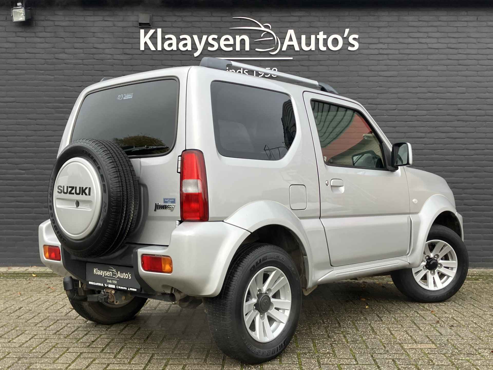 Suzuki Jimny 1.3 Exclusive 4WD | dealer onderhouden | airco | leder interieur | trekhaak | stoelverwarming | dakrails - 6/29