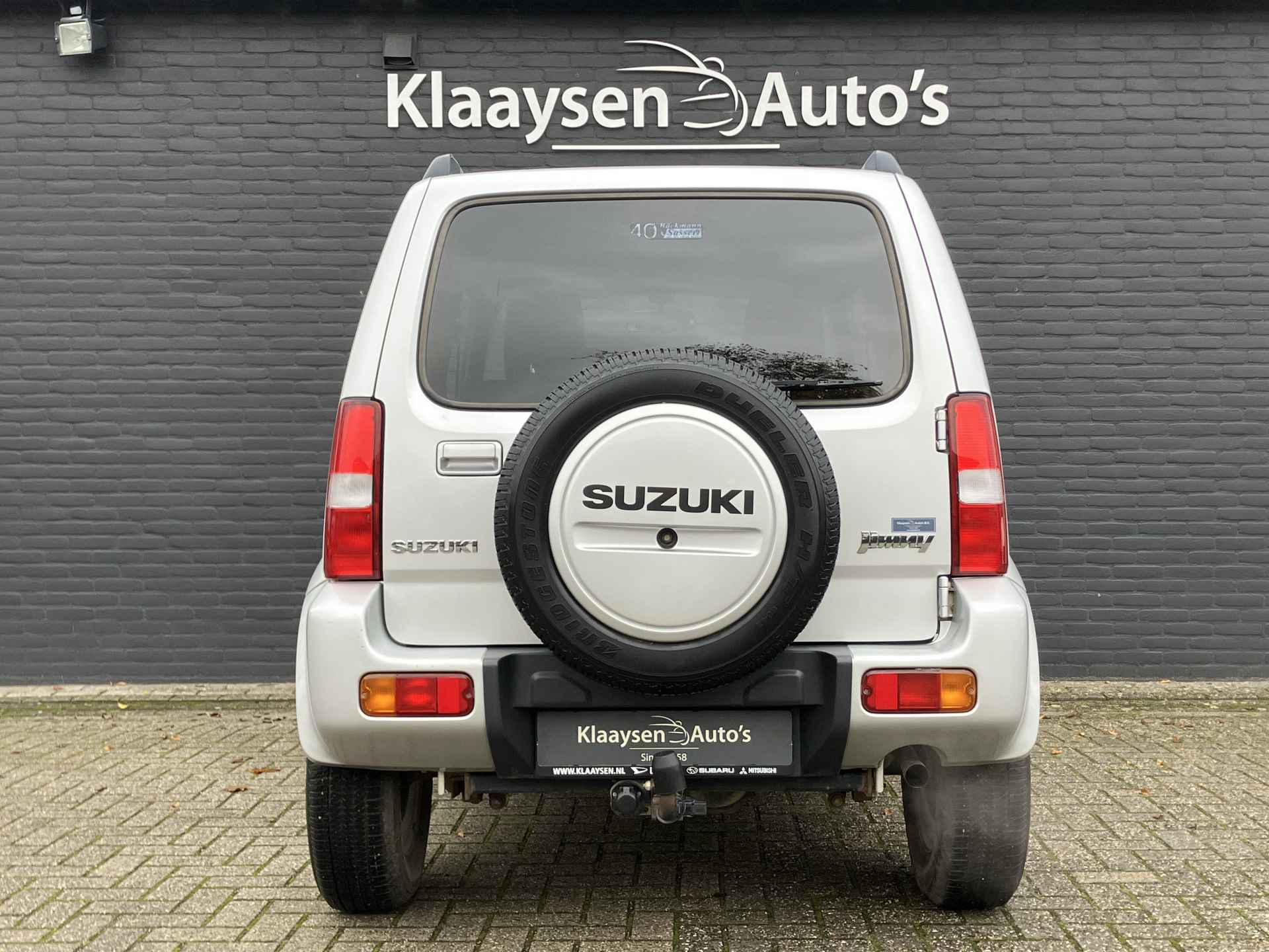 Suzuki Jimny 1.3 Exclusive 4WD | dealer onderhouden | airco | leder interieur | trekhaak | stoelverwarming | dakrails - 7/29