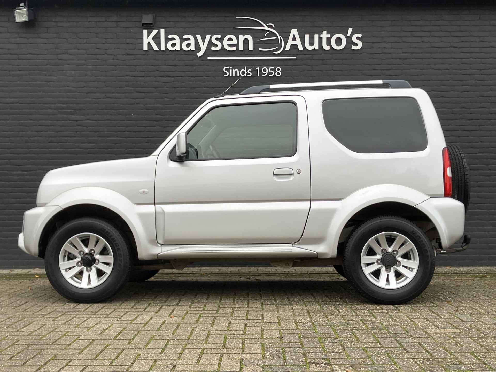 Suzuki Jimny 1.3 Exclusive 4WD | dealer onderhouden | airco | leder interieur | trekhaak | stoelverwarming | dakrails - 9/29