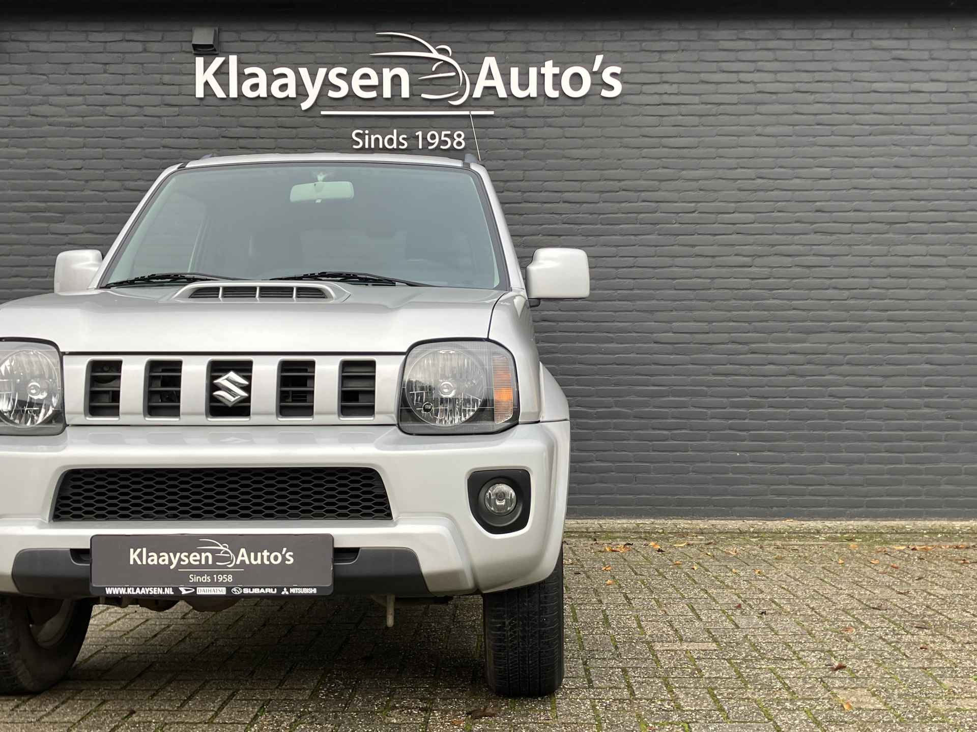 Suzuki Jimny 1.3 Exclusive 4WD | dealer onderhouden | airco | leder interieur | trekhaak | stoelverwarming | dakrails - 10/29