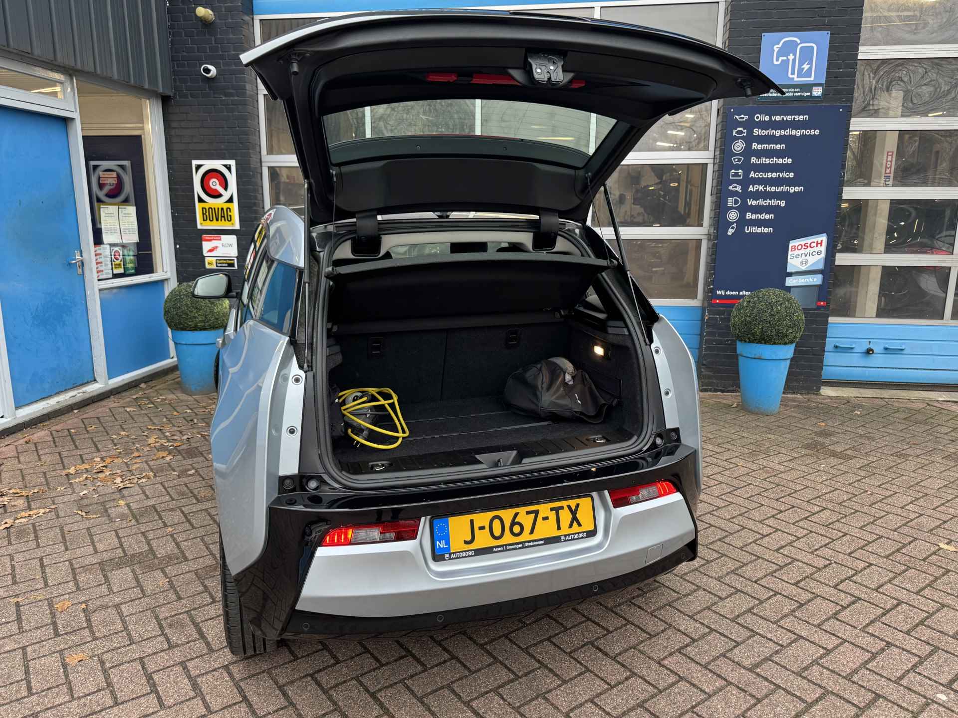 BMW i3 Basis iPerformance 22 kWh | Panoramadak | Apple Carplay | Rijklaar + 12 Maand BOVAG Garantie - 38/50