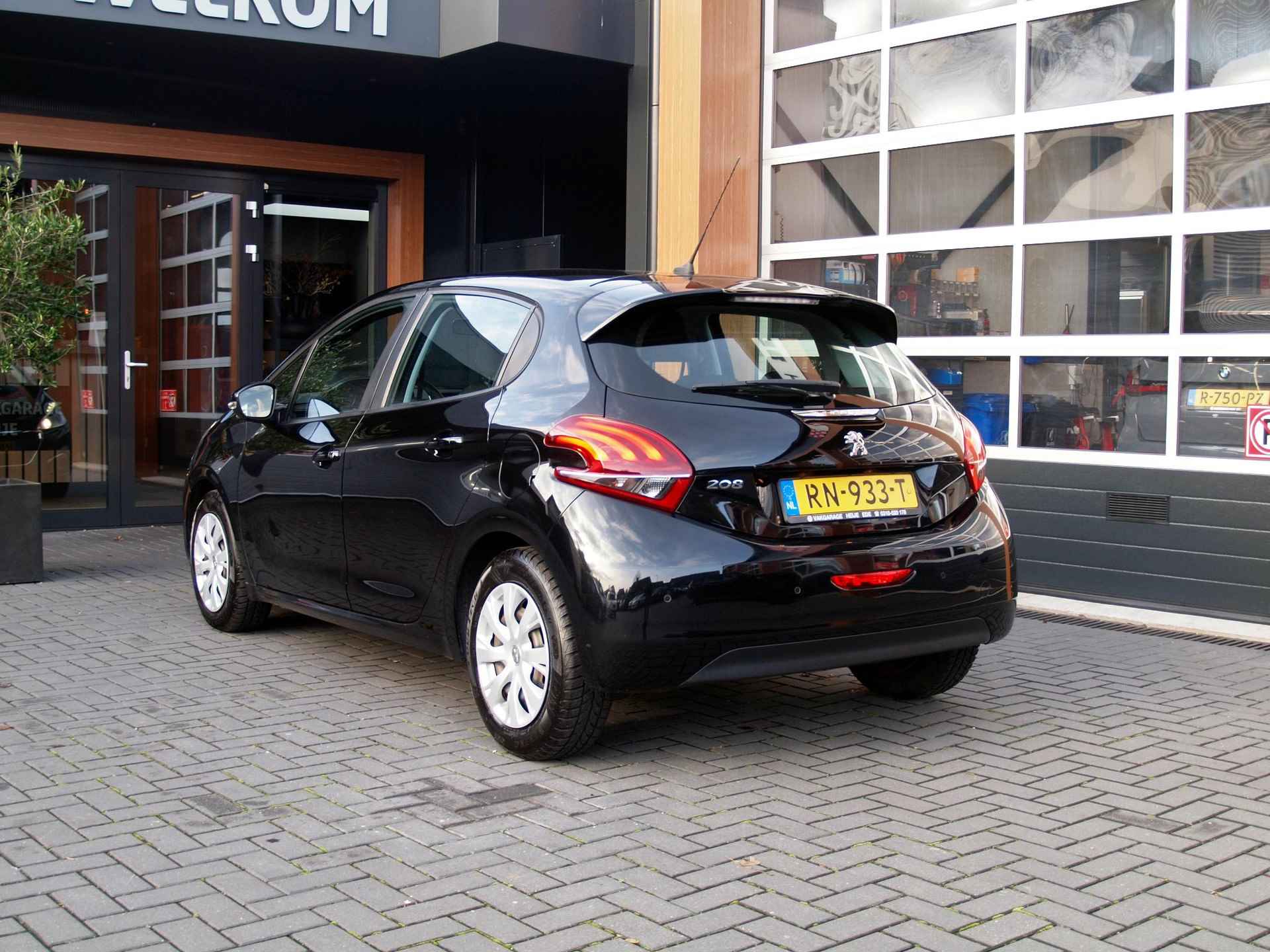 Peugeot 208 1.2 PureTech Blue Lion Apple Carplay | Cruise Control | DAB | Airco | Navigatie - 2/26