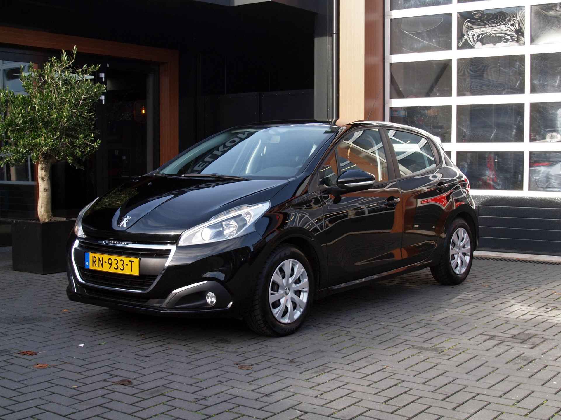 Peugeot 208 1.2 PureTech Blue Lion Apple Carplay | Cruise Control | DAB | Airco | Navigatie - 4/26