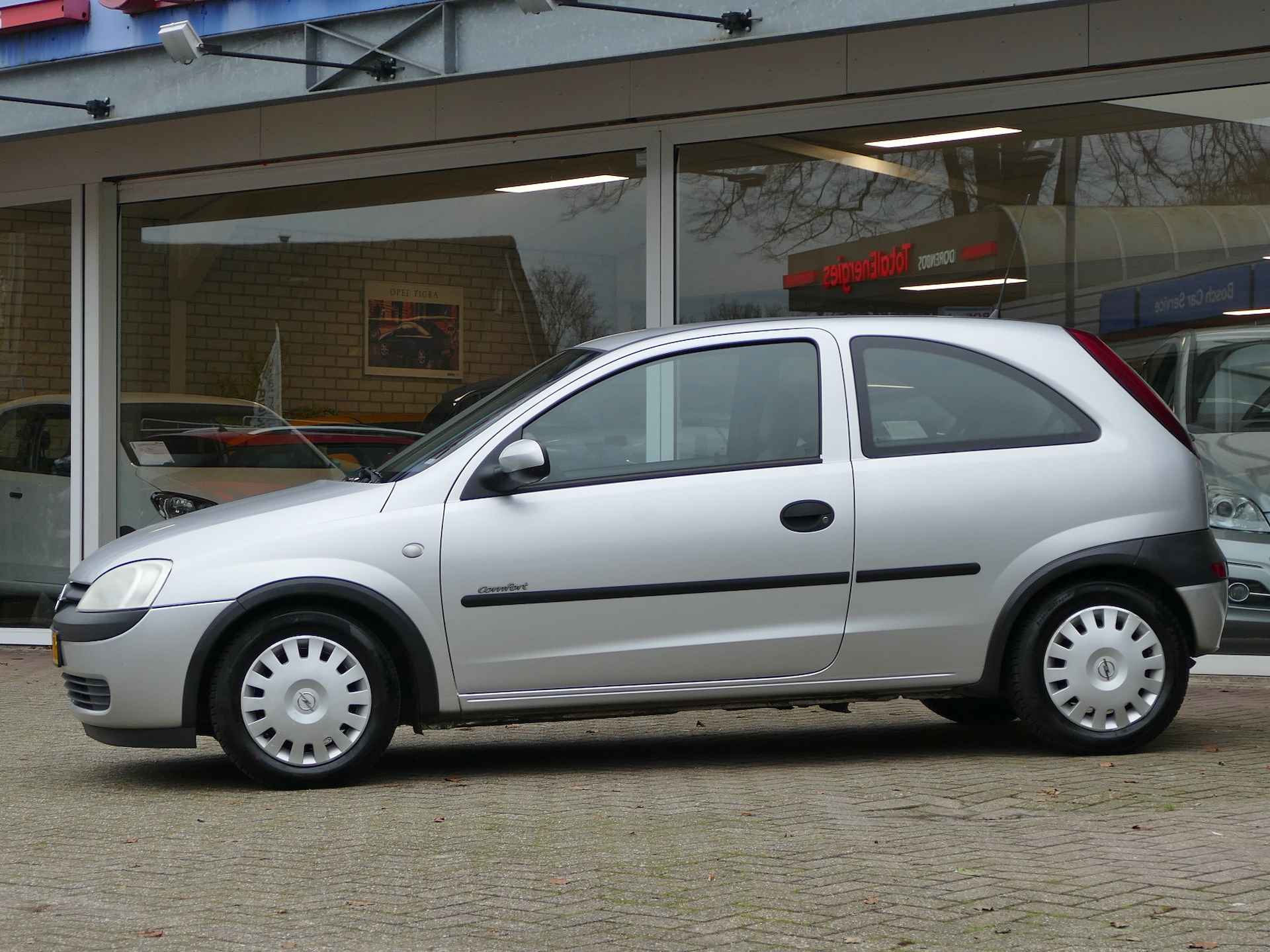 Opel Corsa 1.2-16V Comfort | APK tot 19-10-2025 | all-season-banden - 27/28