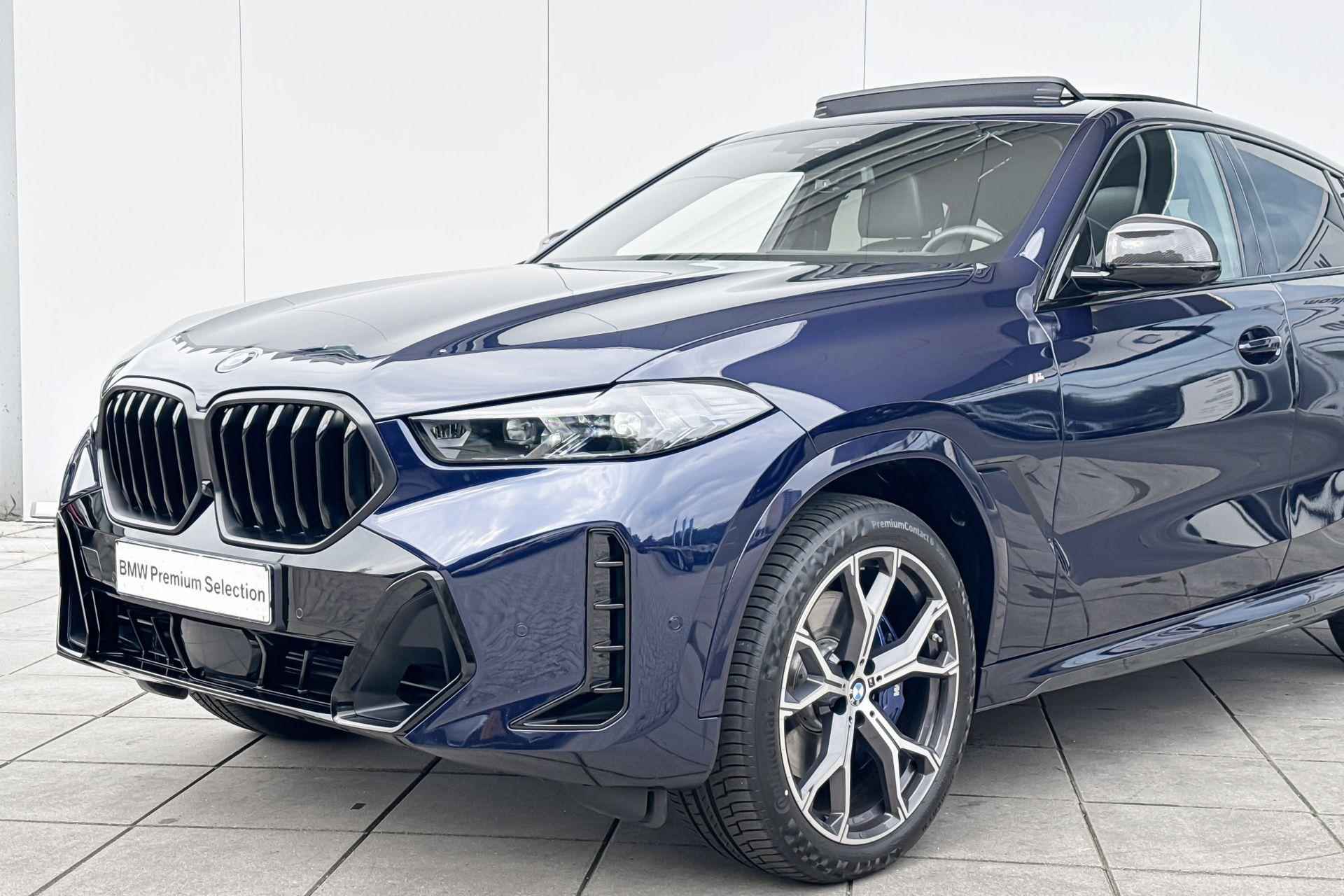 BMW X6 xDrive40i High Executive M-Sport M Sportuitlaatsysteem / 21 Inch / Adaptief M-Onderstel / Comfort Acces / Soft Close / Electrische Zwenkhaak / Shadow Line koplampen / SkyLounge / Getinte Ramen Achter / Stoel Ventilatie / Stoelverwarming Voor & Achter / Leder Dashboard / Driving Assistant Prof / Parking Assistant Prof / Bowers & Wikins - 21/25