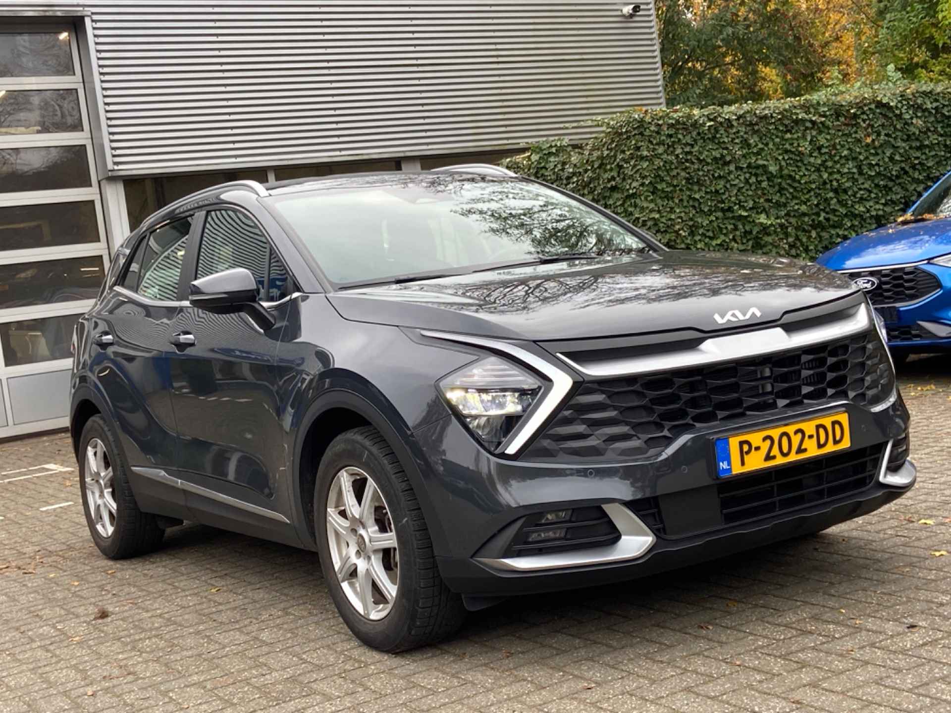 Kia Sportage 1.6 T-GDi Plug-In DynamicLine | NL-AUTO! | 1E EIGENAAR | ADAPTIVE CRUISE | CAMERA | TREKHAAK | WIDESCREEN | PARK SENS V+A | CLIM - 2/10