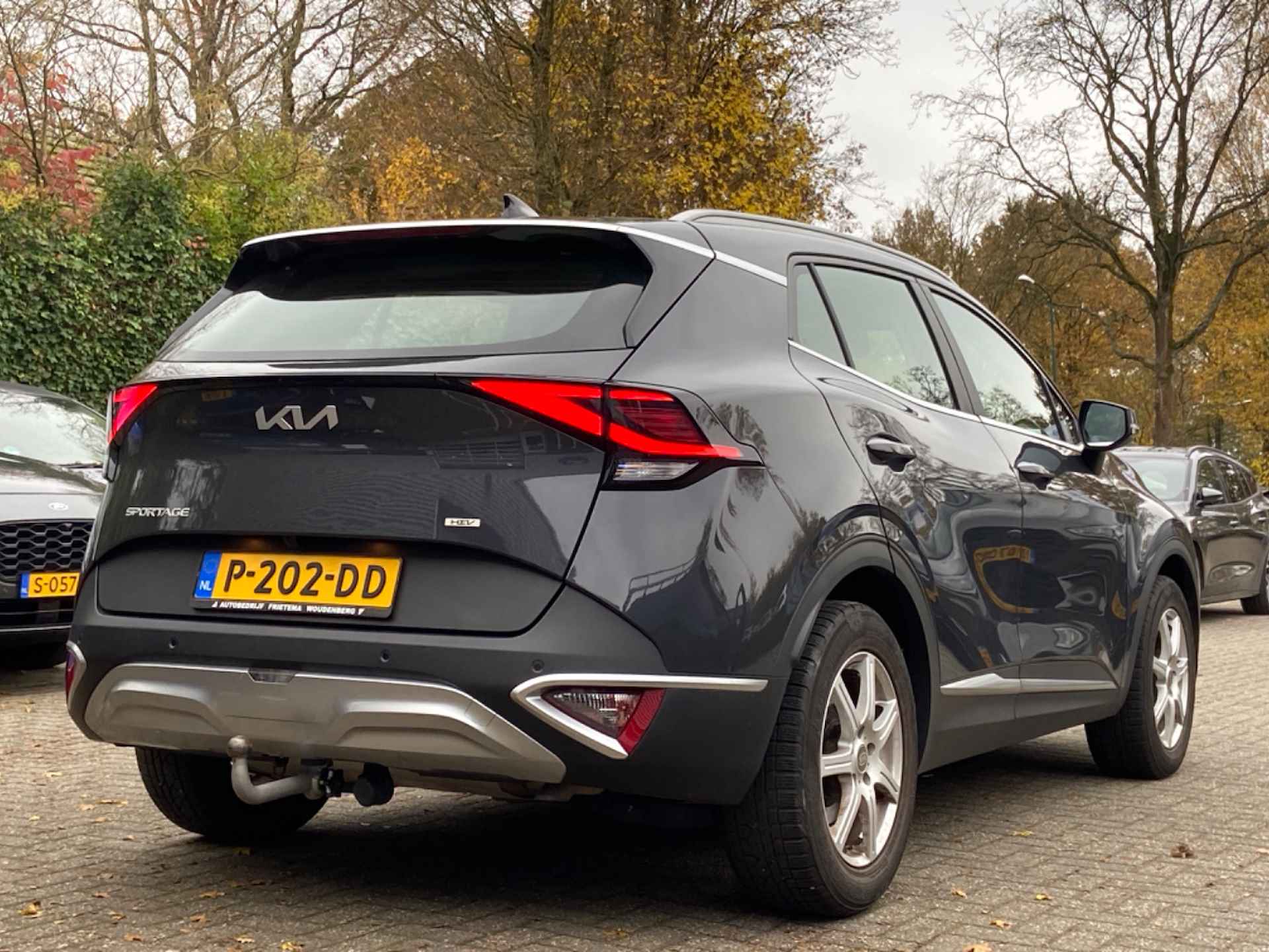 Kia Sportage 1.6 T-GDi Plug-In DynamicLine | NL-AUTO! | 1E EIGENAAR | ADAPTIVE CRUISE | CAMERA | TREKHAAK | WIDESCREEN | PARK SENS V+A | CLIM - 3/10