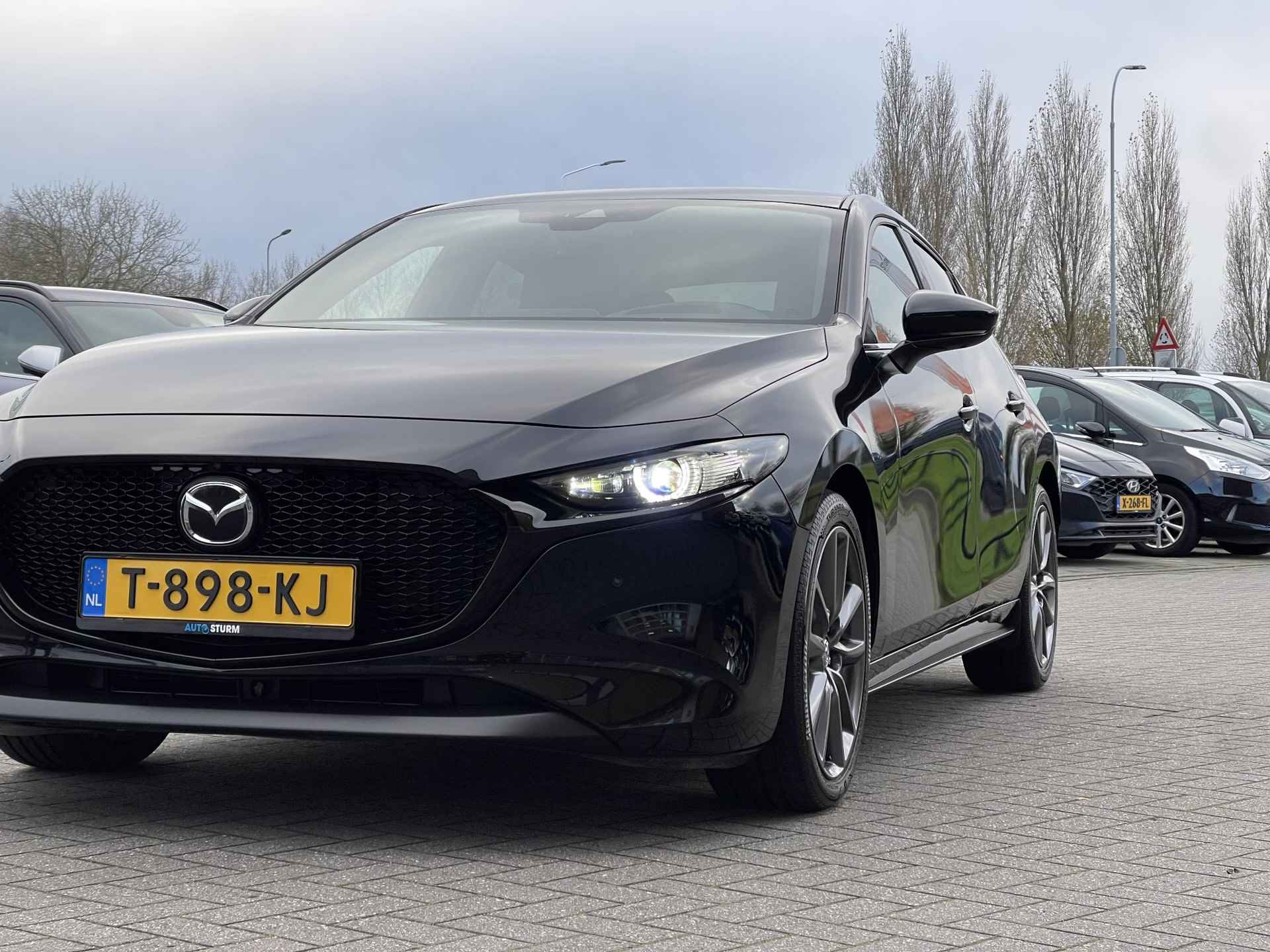 Mazda 3 2.0 e-SkyActiv-G M Hybrid 122 Comfort | Head-Up Display | BOSE Audio | 360° Camera | Stuur- + Stoelverwarming | 18'' Velgen | Rijklaarprijs! - 22/30