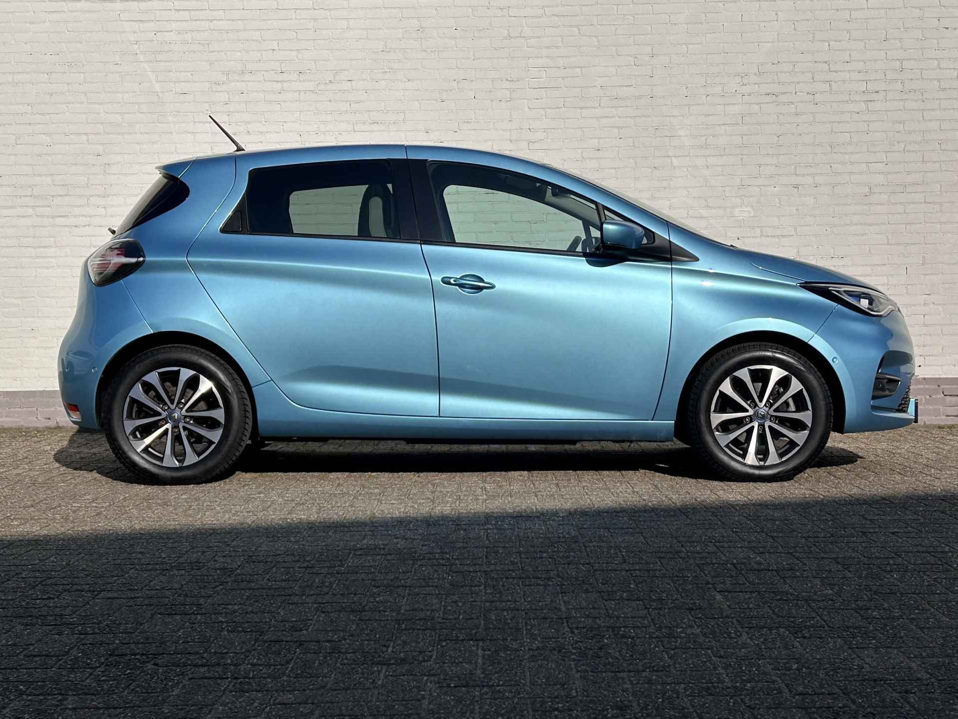 Renault ZOE R135 Intens 52 kWh (ex Accu) / SoH accu 80,55 % / Snel laden / Warmtepomp / Stoel&stuur verwarming / Navigatie / Climate Control /  Apple carplay & Aindroid auto / - 35/43