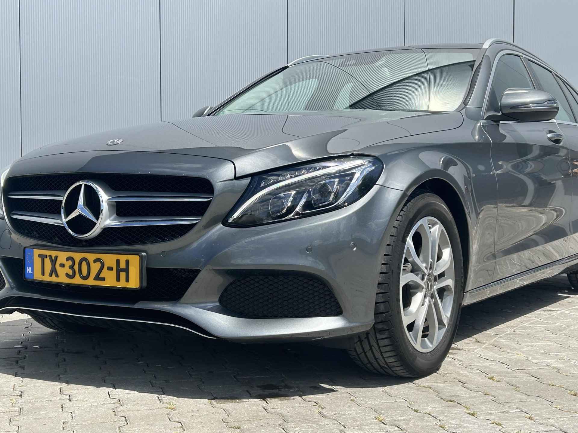 Mercedes-Benz C-klasse Estate 180 Business Solution AMG / Stoelverwarming voor / Navigatie / Climate Control / Trekhaak - 23/37