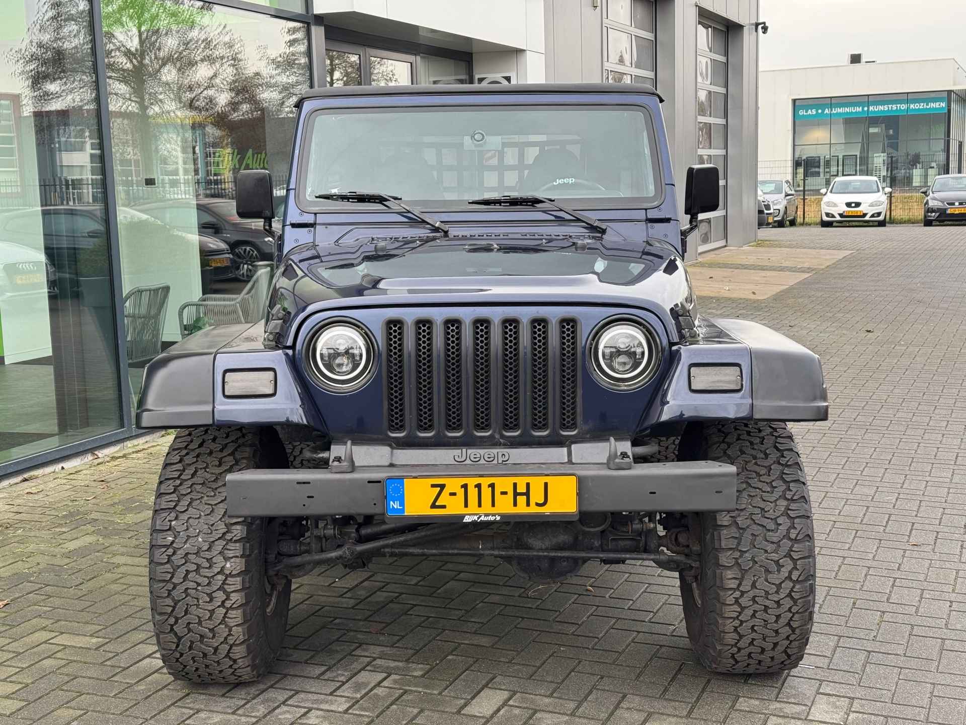 Jeep Wrangler 2.5i Softtop + Hardtop - 18/24