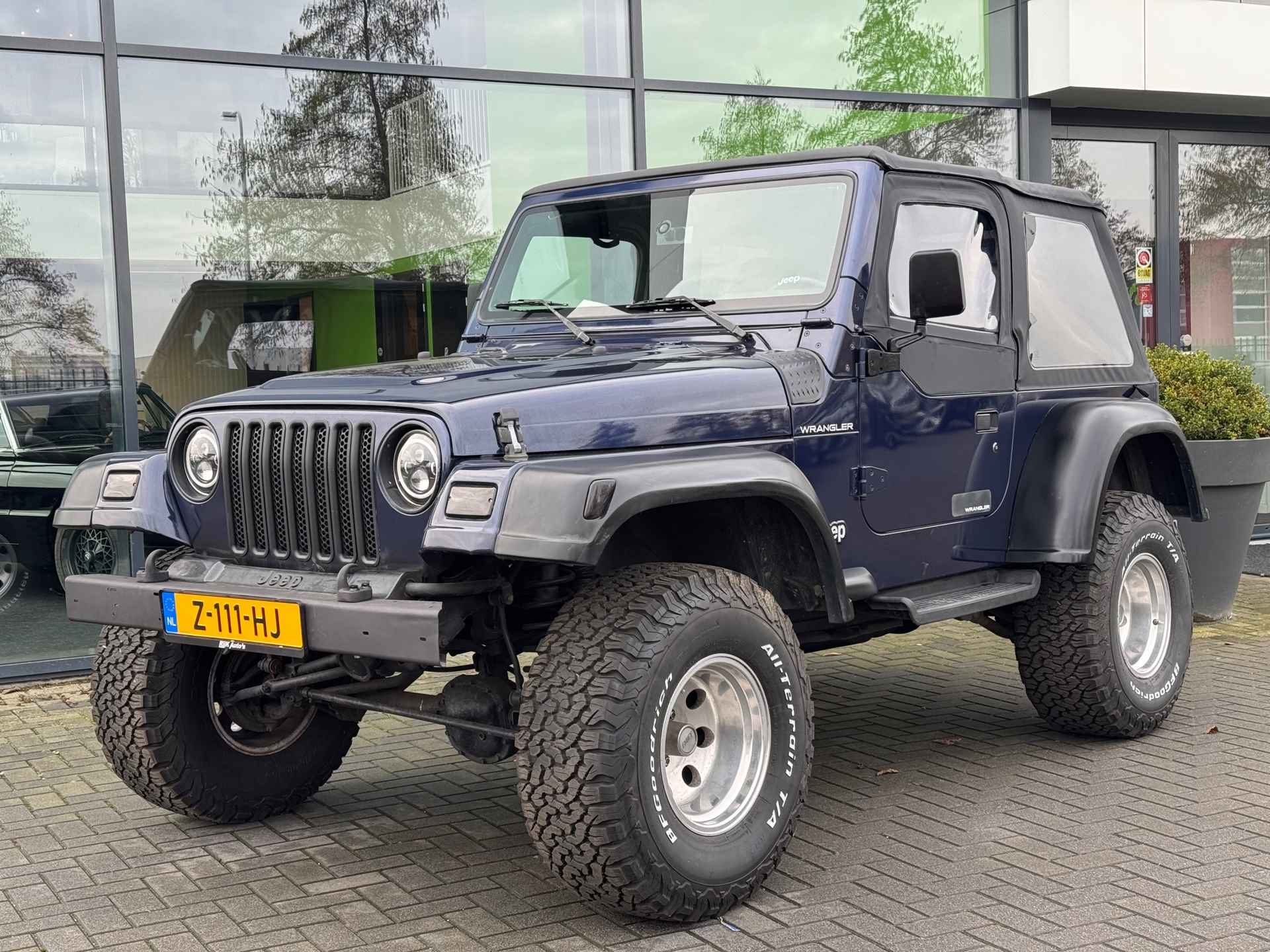 Jeep Wrangler 2.5i Softtop + Hardtop - 19/24