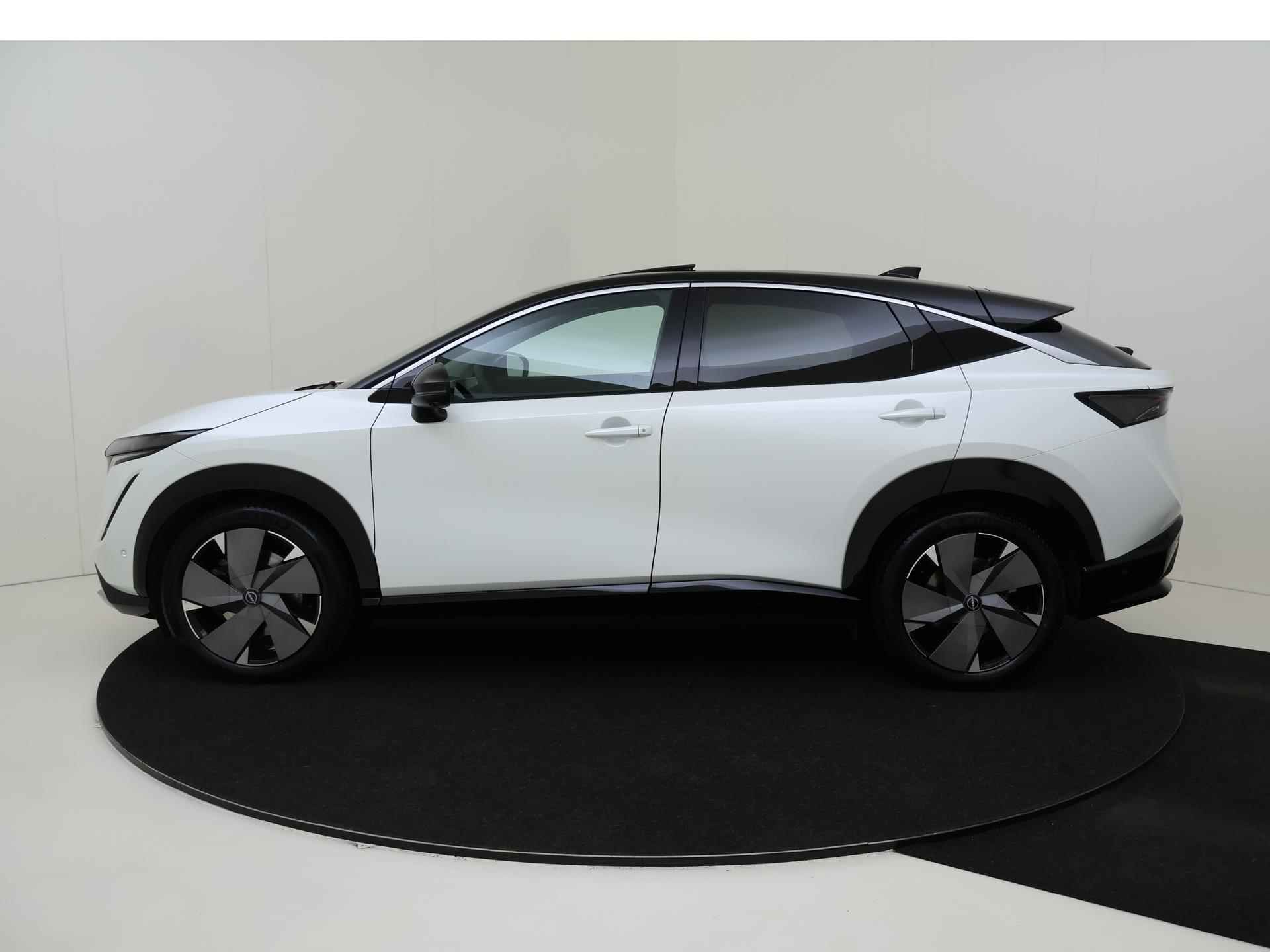 Nissan Ariya Evolve 91 kWh | 20" LMV | Two-Tone | Leder/Alcantara | Stoelverwarming en -ventilatie | Stuurwiel verwarmd | Achterbank verwarmd | ProPILOT | Bose Audio | 360-graden Camera | Elek. Achterklep - 2/31
