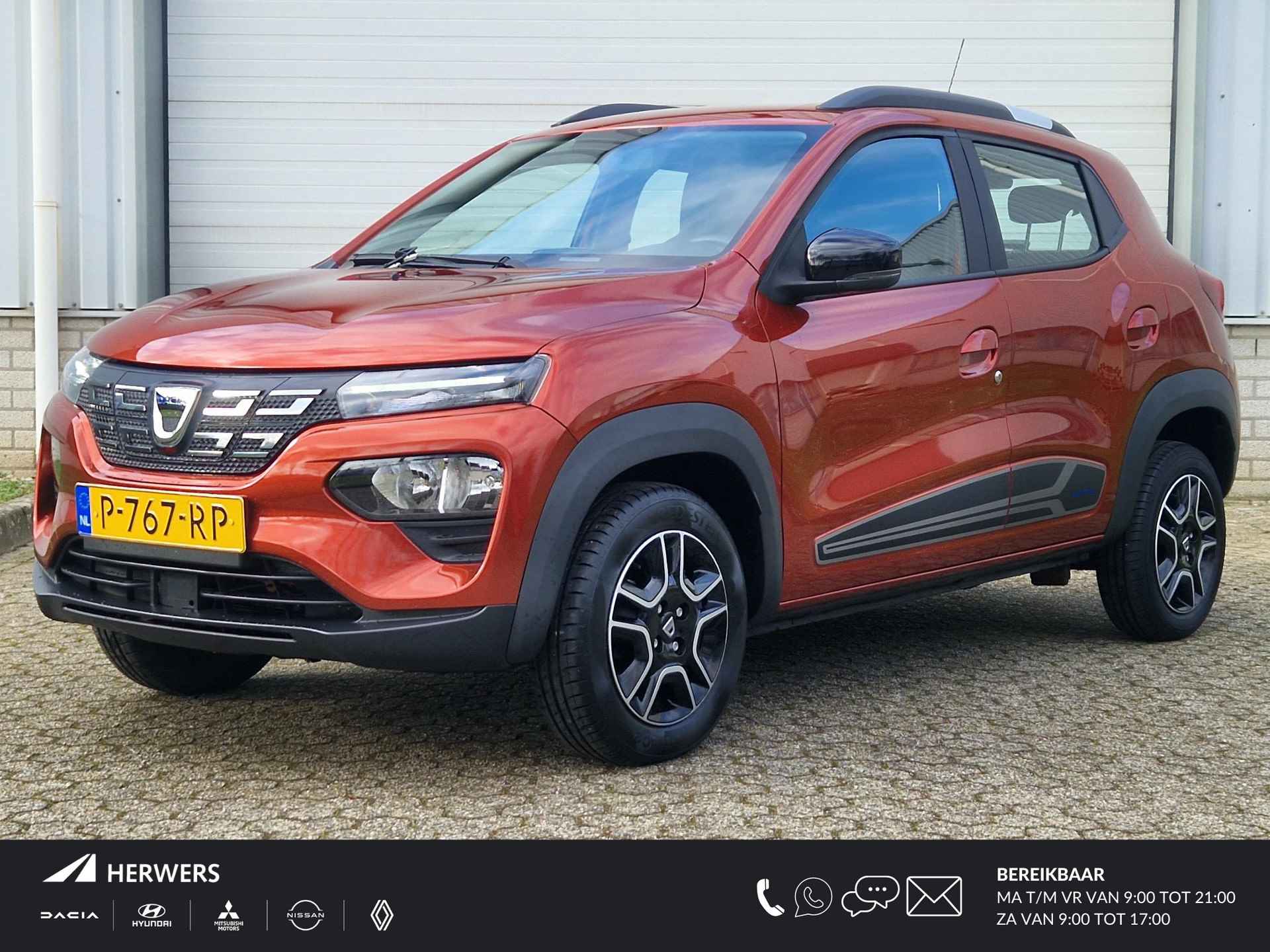 Dacia Spring Comfort Plus (Orange Pack) 27 kWh / Dealer Onderhouden / Originele NL  Auto / CCS Snelladen / Apple Carplay & Android Auto / Achteruitrijcamera / Navigatie /