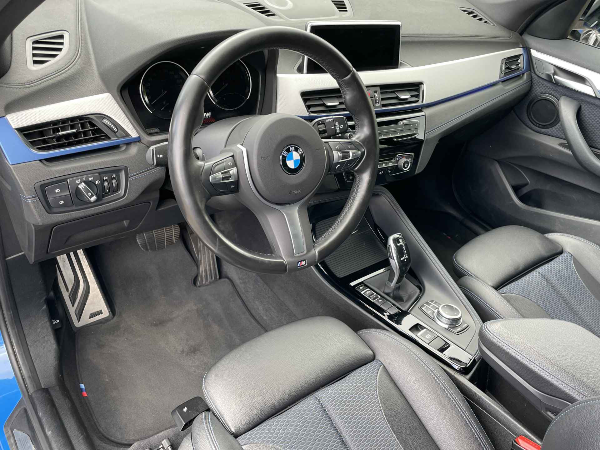 BMW X1 sDrive18i | M-Sport | 18'' | Elek. Achterklep | PDC voor + achter | Stoelverw. | Getint Glas - 9/30