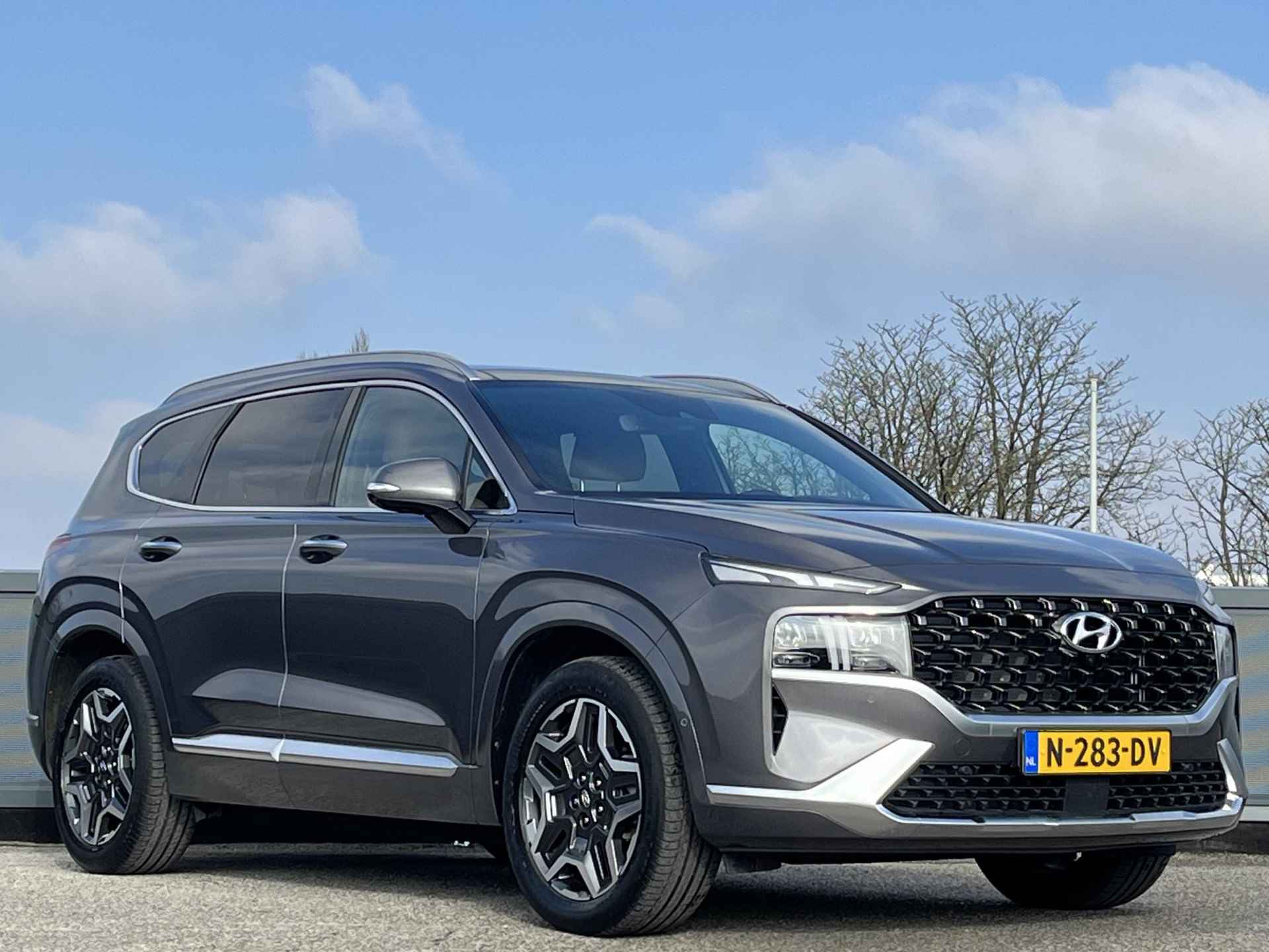 Hyundai Santa Fe 1.6 T-GDI HEV 230 PK Premium Plus Sky | Unieke kmstand | Schuifkanteldak | Lederen bekleding | Navi Pro | - 6/69