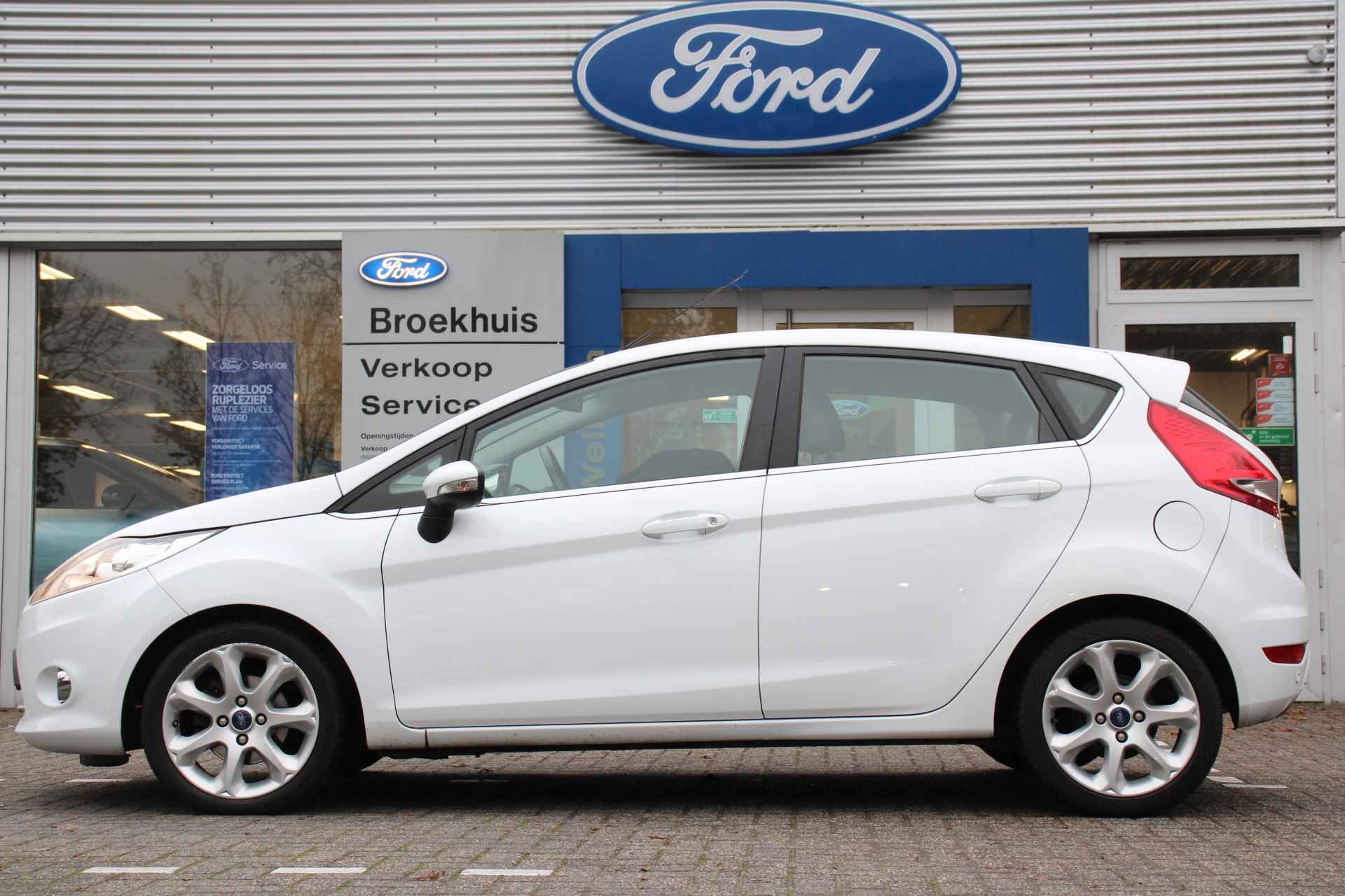 Ford Fiesta 1.25 TITANIUM | NL-AUTO! | DEALER OH! | CLIMA | VOORRUITVERWARMING | CRUISE | PARK SENS | LM. VELGEN | PRACHTIGE STAAT! - 2/28