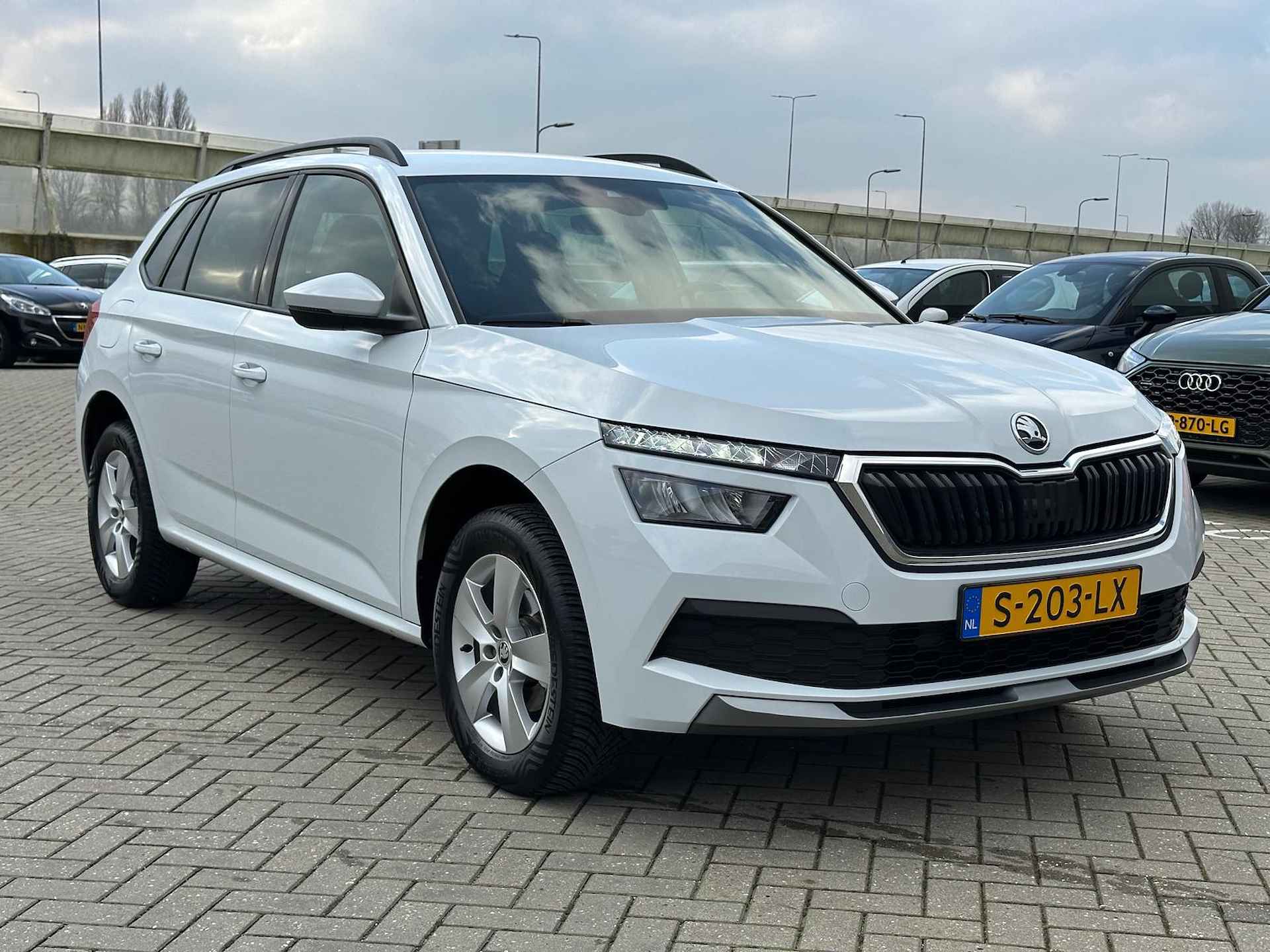 Škoda Kamiq 1.0 TSI Sport Business / Navigatie / Digitaal dashboard / Parkeersensoren achter - 10/31