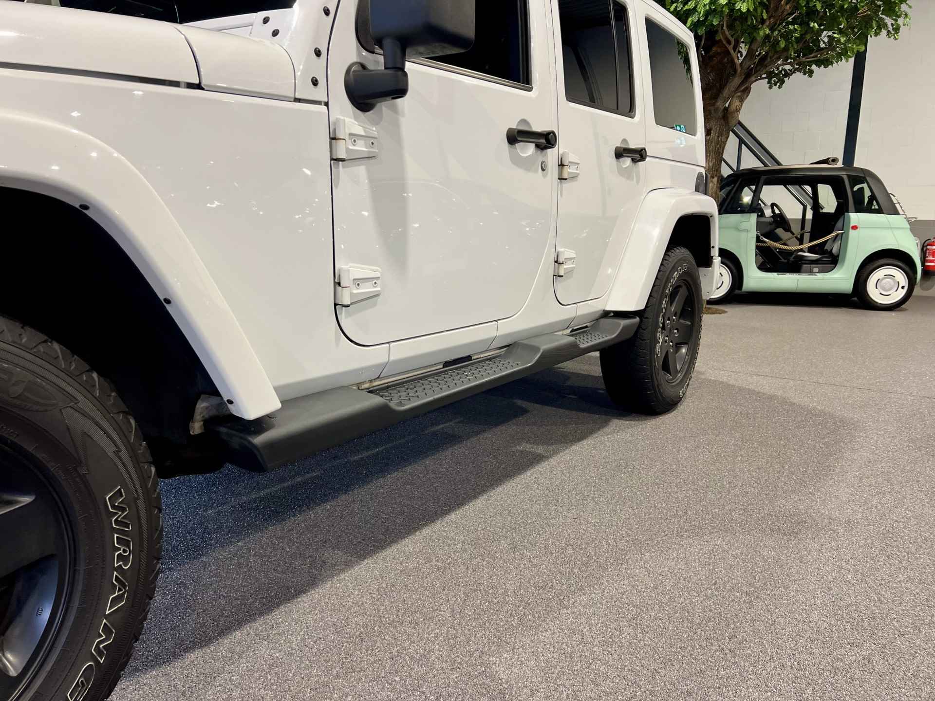 Jeep Wrangler Unlimited 3.6 Arctic Trekhaak | Airco Clima | Verwarmde stoelen | Sensoren - 18/45