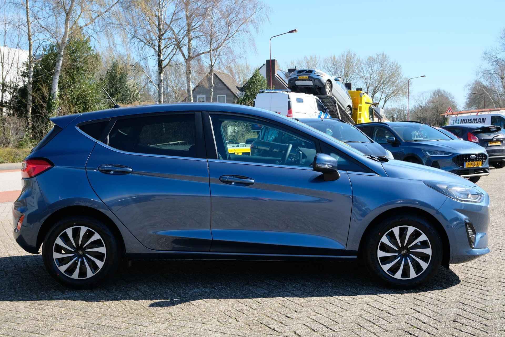 Ford Fiesta 1.0 EcoBoost Hybrid Titanium 125pk VOORRAAD | Incl. all season banden! | Chrome Blue | Driver Assistance Pack 2 | Winter Pack | Comfort Pack - 3/19