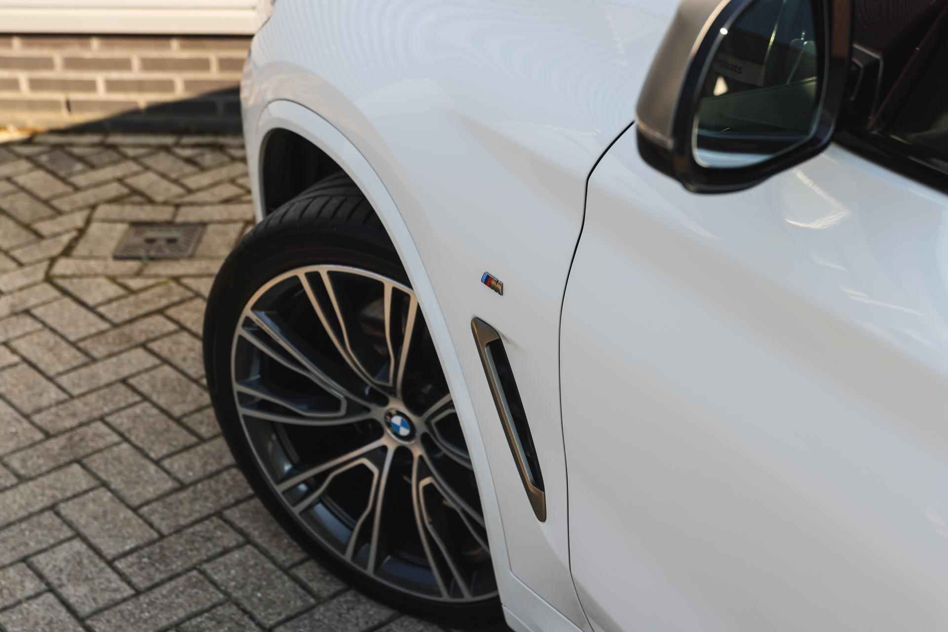 BMW X4 M40i High Executive Automaat / Panoramadak / Stoelventilatie / Adaptieve LED / Head-Up / Harman Kardon / Navigatie Professional / Verwarmd stuurwiel - 35/41