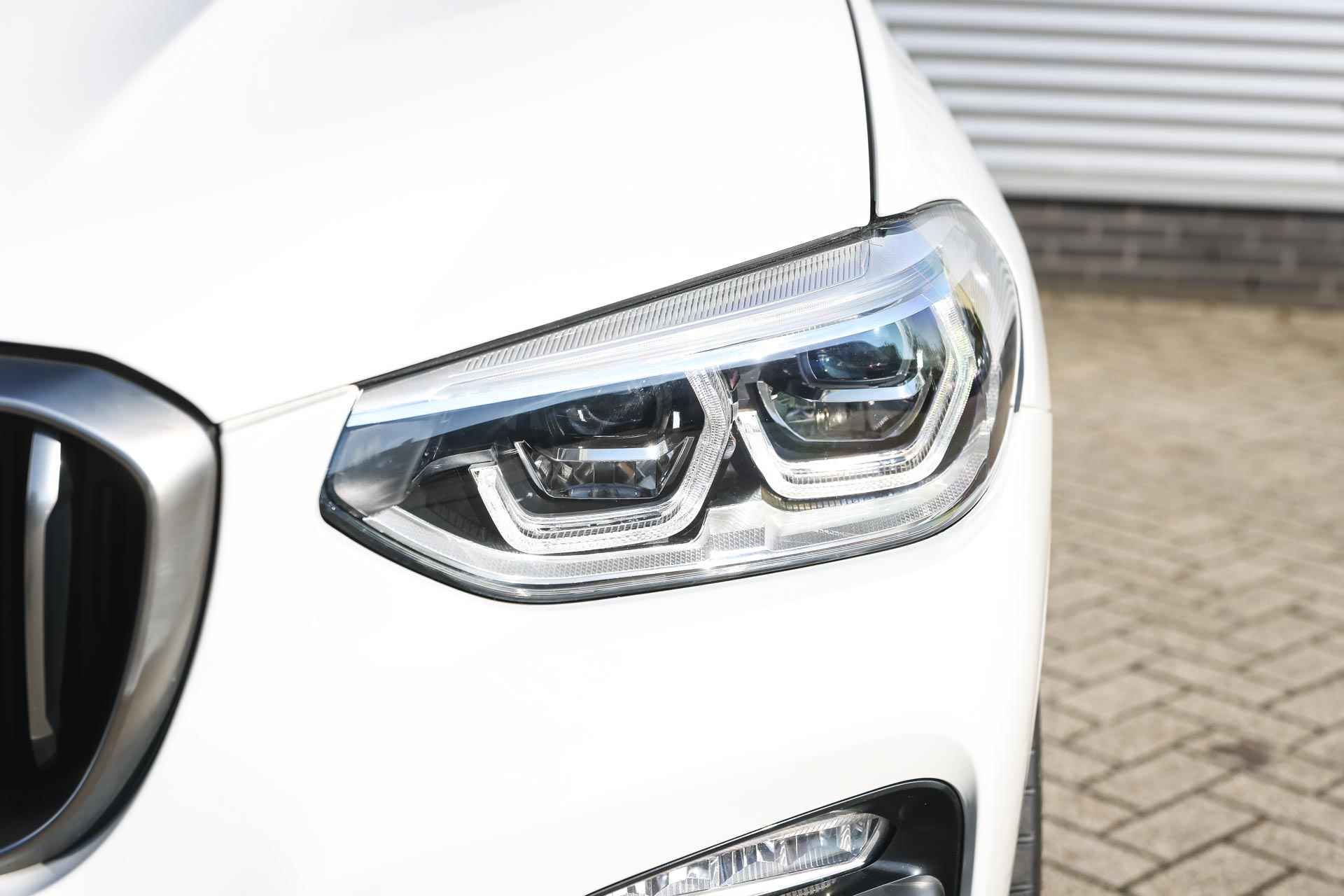 BMW X4 M40i High Executive Automaat / Panoramadak / Stoelventilatie / Adaptieve LED / Head-Up / Harman Kardon / Navigatie Professional / Verwarmd stuurwiel - 34/41