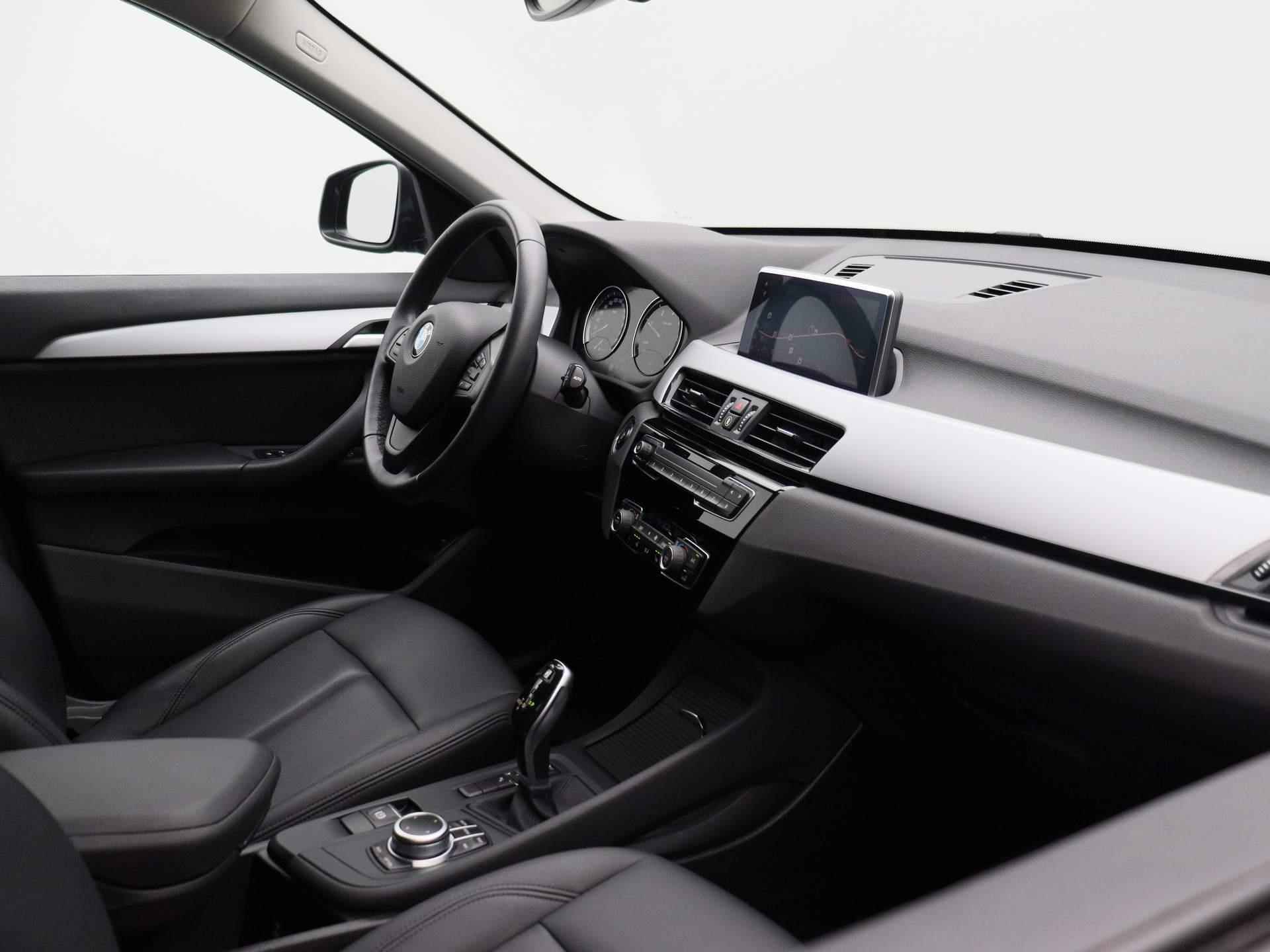 BMW X1 sDrive16d Executive * | Leder | Navigatie | Climate Control | Parkeersensoren | Cruise Control | Bluetooth | Stoelverwarming | Elektrische Achterklep | - 33/37