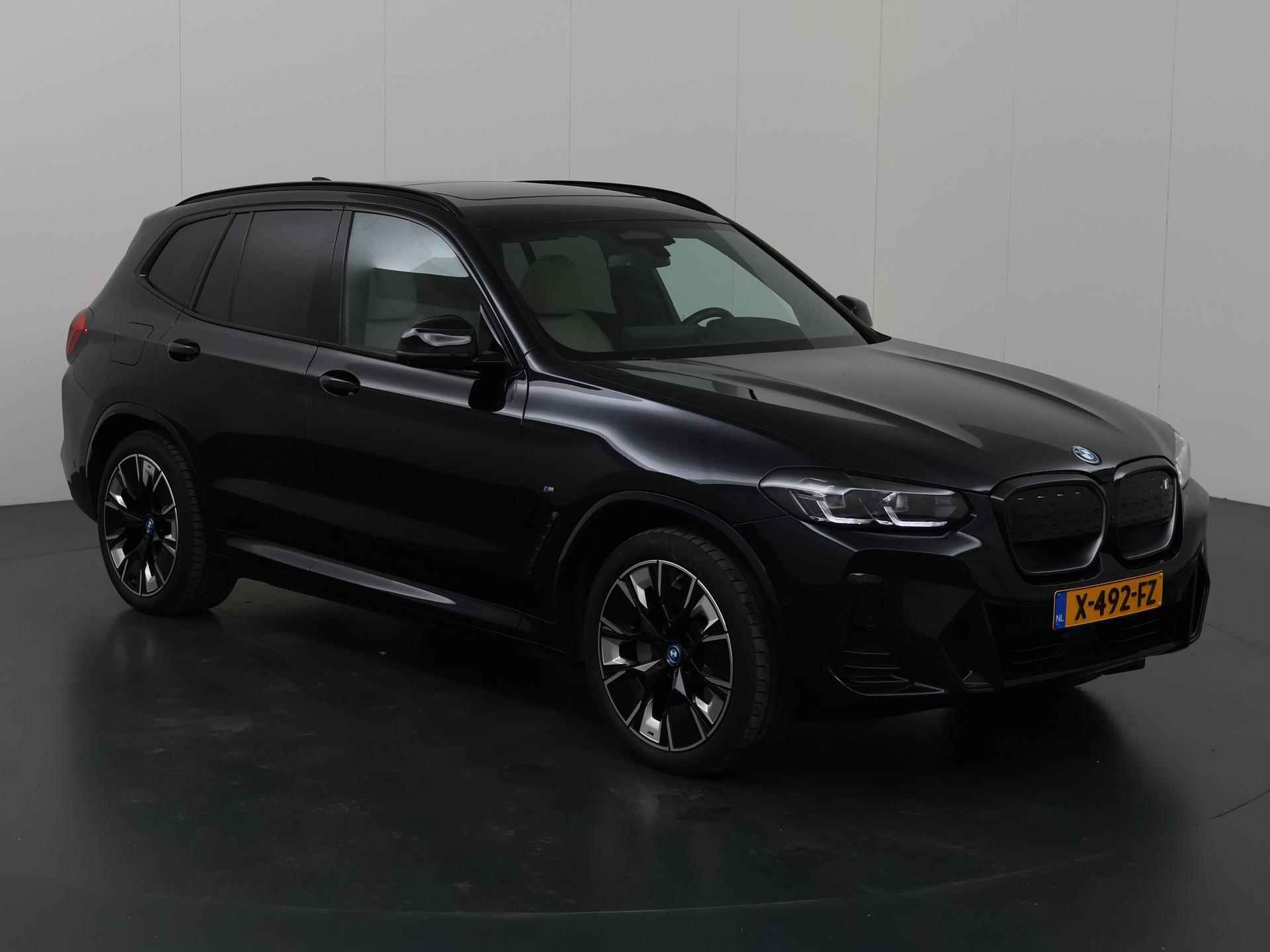 BMW iX3 High Executive 80 kWh M Sport | Trekhaak | Navigatie | Parkeercamera | Stoelverwarming | Keyless Go | Panormadak | Sportstoelen | - 24/54