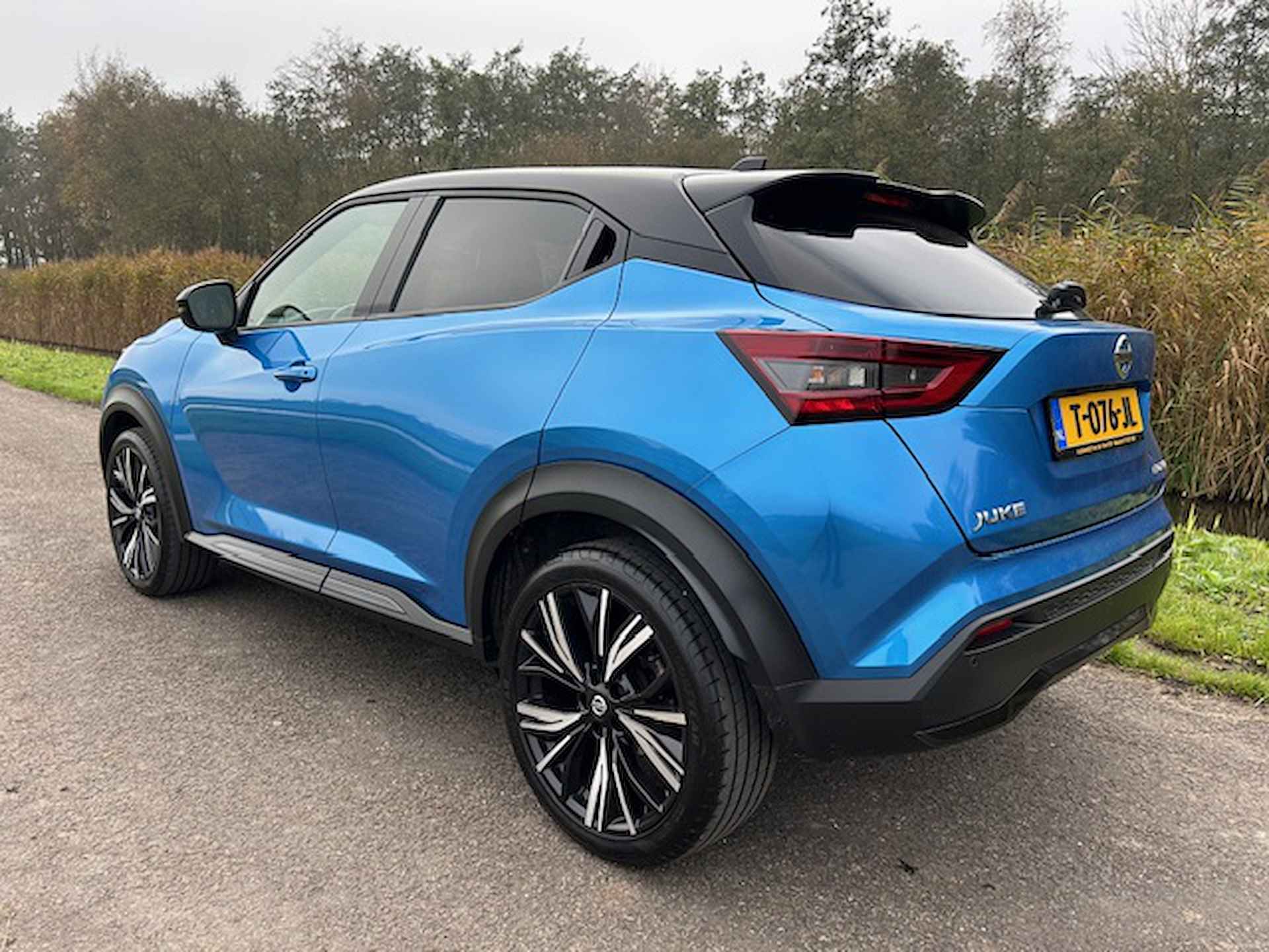 NISSAN Juke 1.0 DIG-T 114pk N-Design | Navigatie | Apple carplay/ Android auto | Camera | Pdc V+A | BOSE | Half leder/ Alcantara | Two-tone lak | Rijklaar prijs! - 7/24