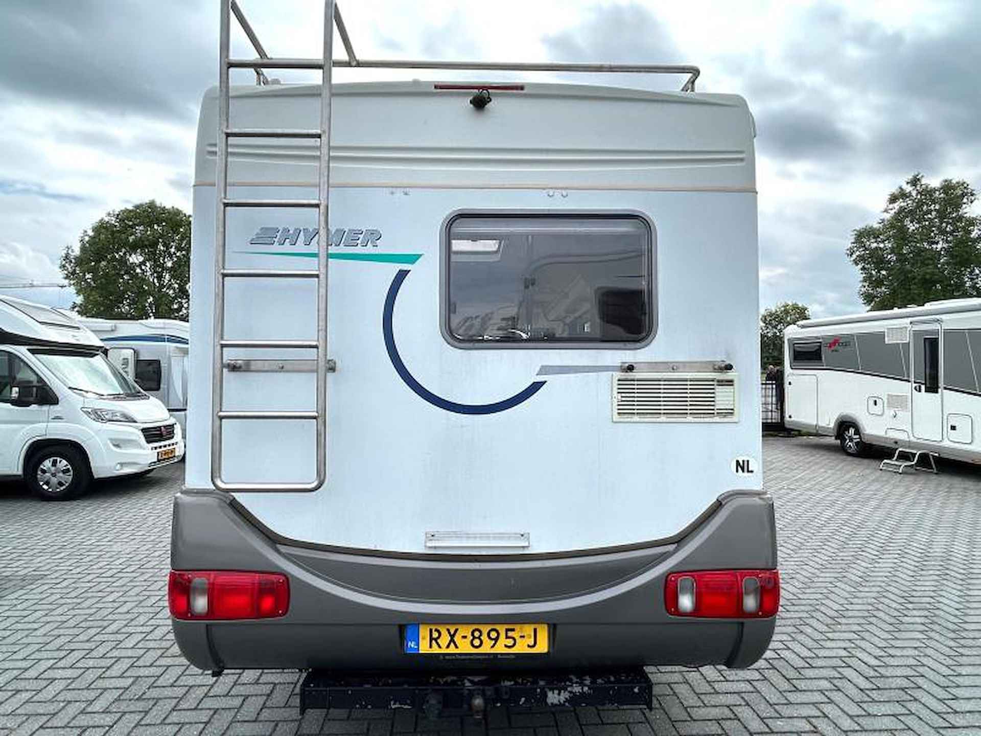 Hymer B544  hefbed/122pk/1999/6-meter - 8/22