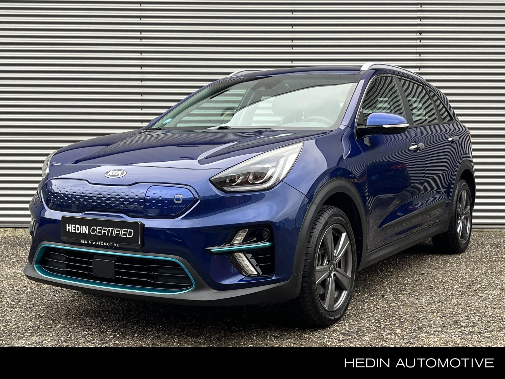 Kia e-Niro ComfortLine 64 kWh Inclusief zomer en winterset / Stoelverwarming voor / Parkeercamera / Adaptieve cruise control / Parkeersensors / Stuurverwarming / Half lederen bekleding /