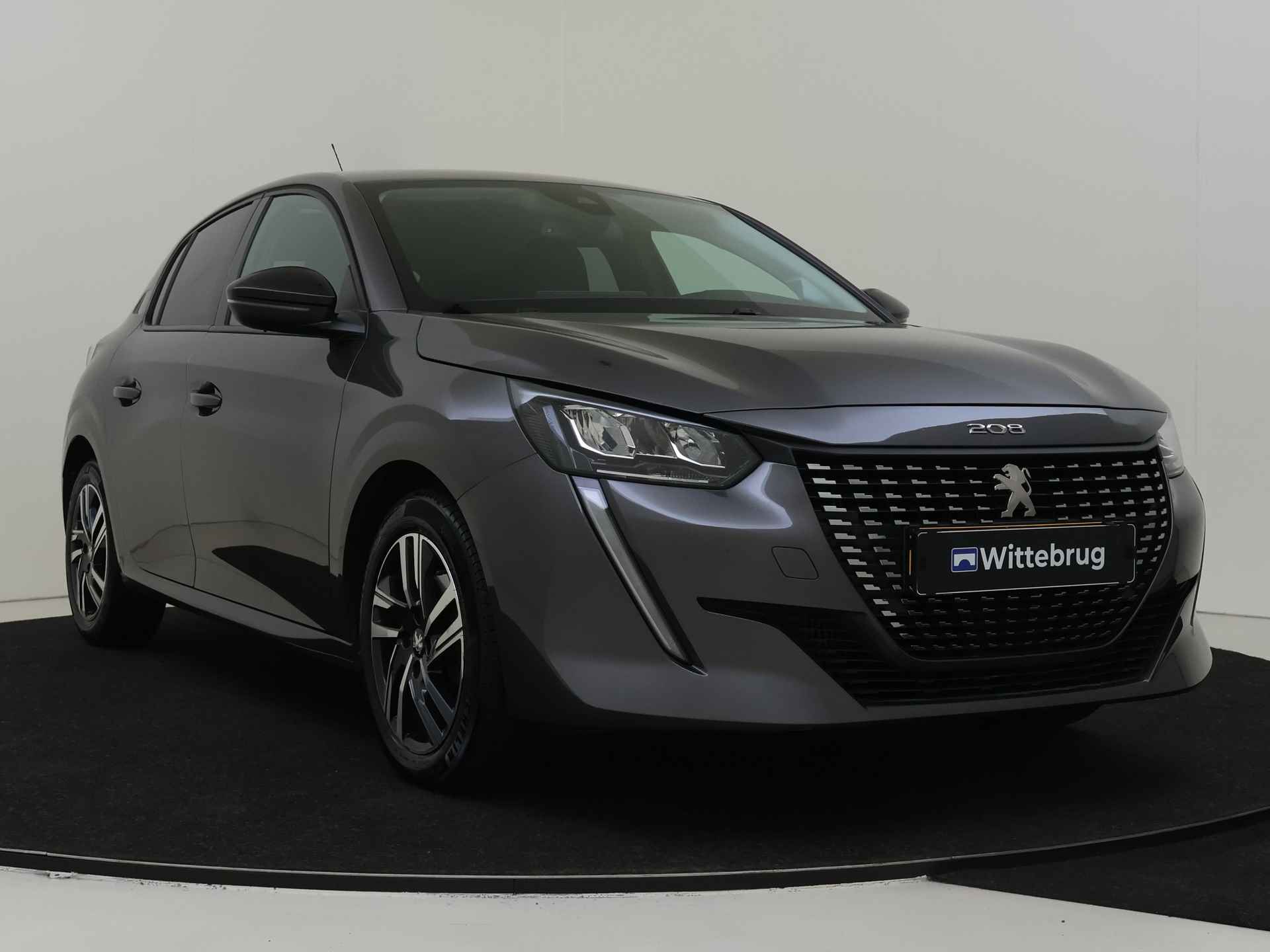 Peugeot 208 1.2 PureTech 101pk Allure Pack | 3D Navi | Camera | Climate Control - 4/38