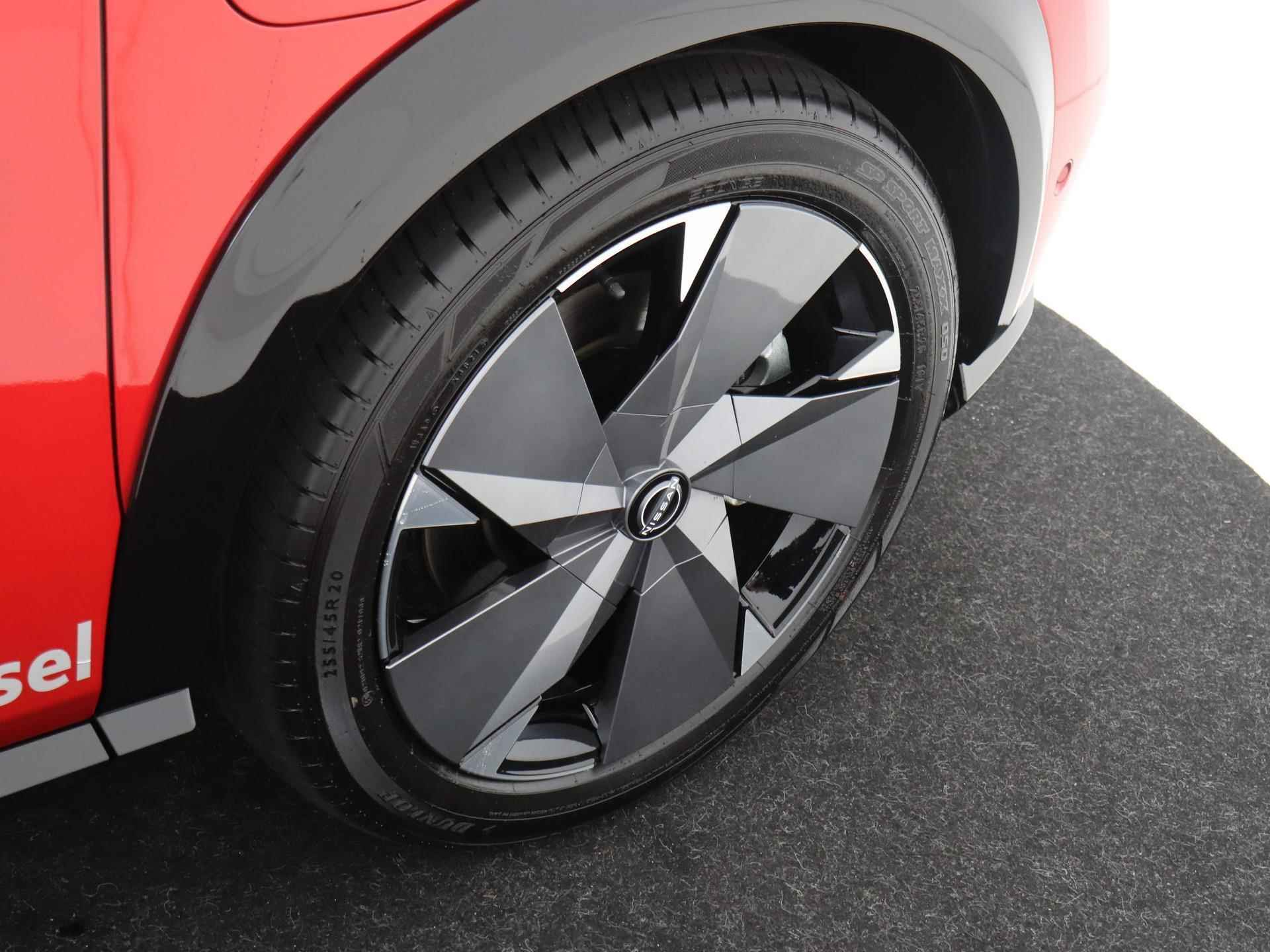Nissan Ariya 87 kWh Evolve | Sunset Red | Duo-Tone | Panoramadak | Stoelventilatie - 10/31