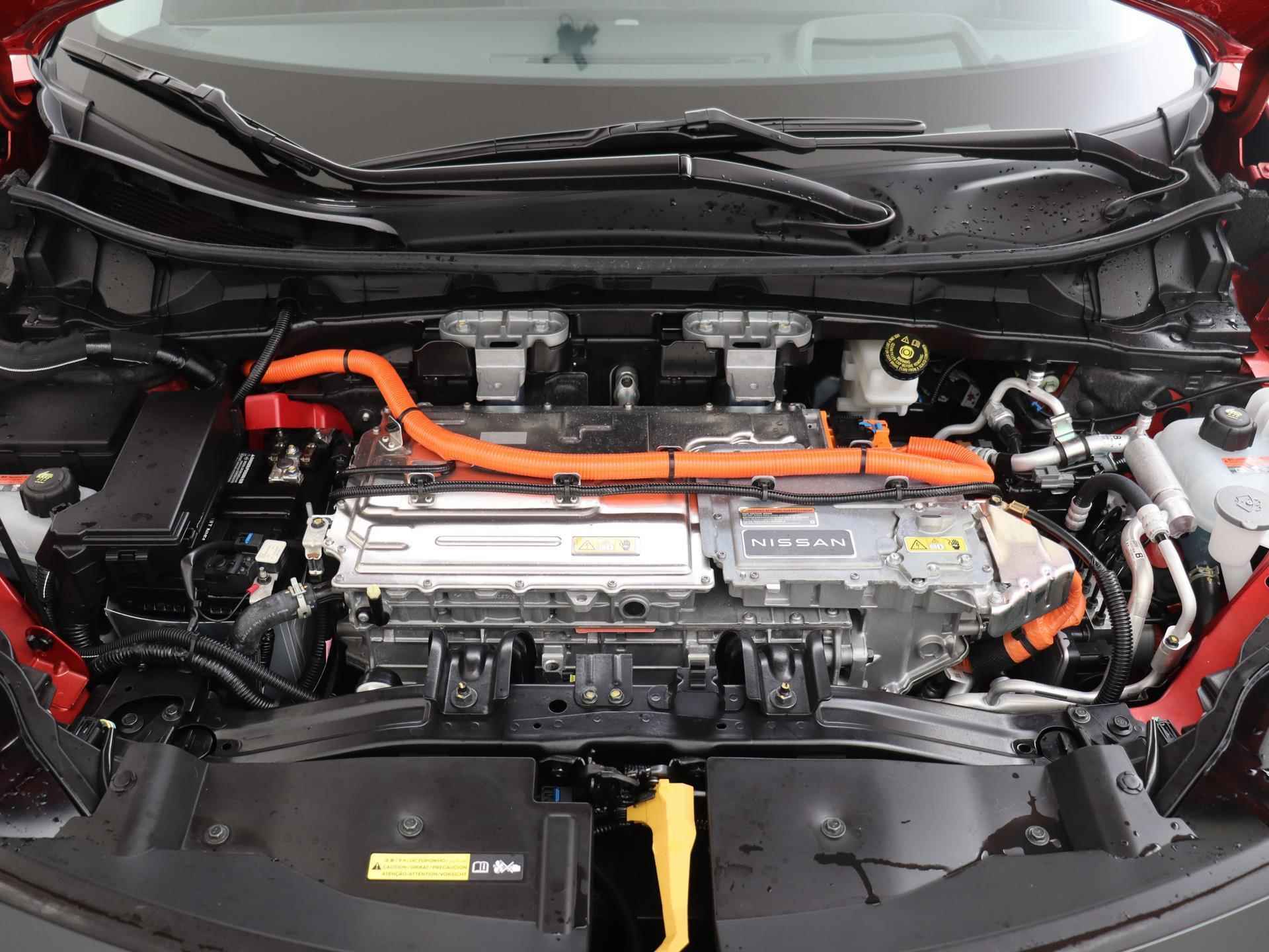 Nissan Ariya 87 kWh Evolve | Sunset Red | Duo-Tone | Panoramadak | Stoelventilatie - 11/31