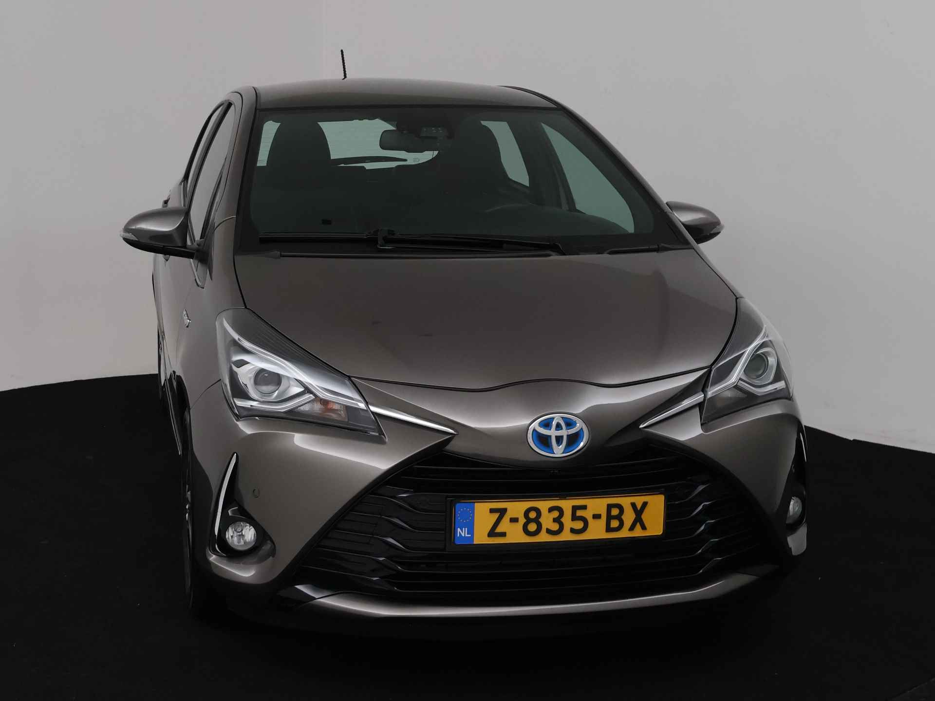 Toyota Yaris 1.5 Hybrid Premium Limited | Camera | Panoramadak | LM velgen | Half leder | - 28/41