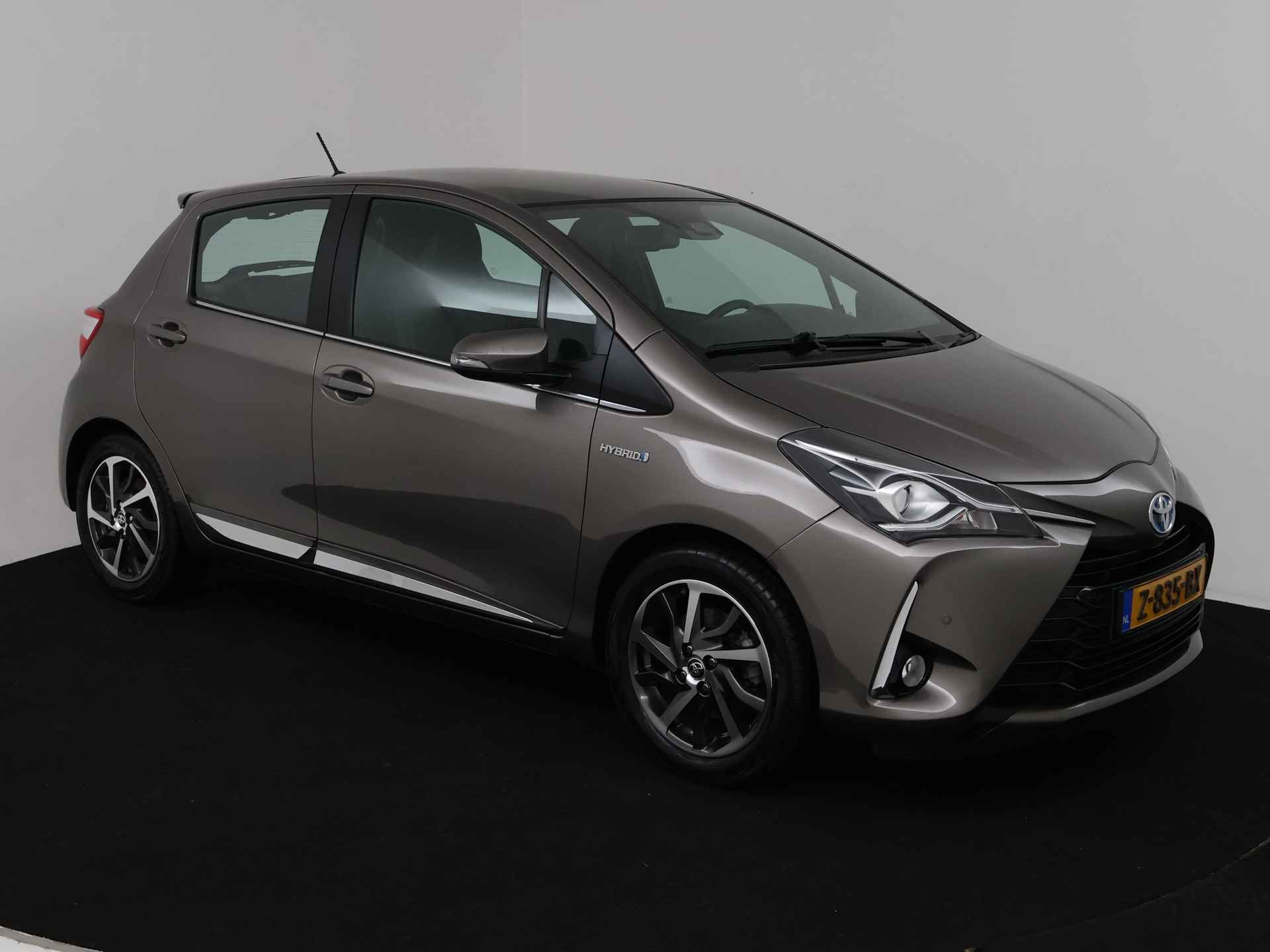 Toyota Yaris 1.5 Hybrid Premium Limited | Camera | Panoramadak | LM velgen | Half leder | - 29/41