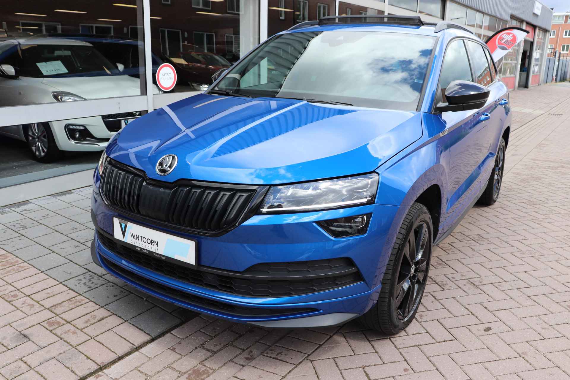 Škoda Karoq 1.5 TSI ACT Sportline Business Wegklapbare trekhaak, panoramadak - 4/45