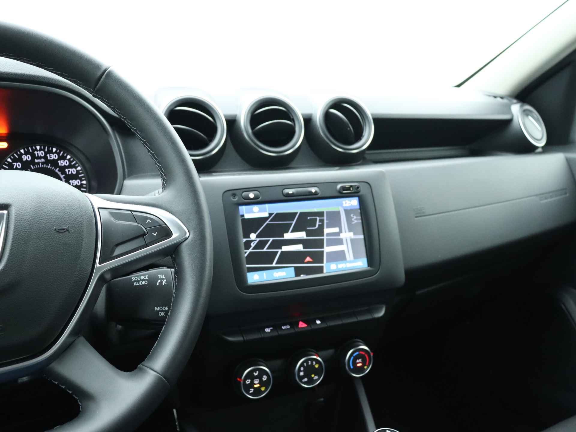 Dacia Duster 1.0 TCe Comfort | Cruise Control | Apple Carplay Android Auto | Dakrail | LM velgen | - 8/38
