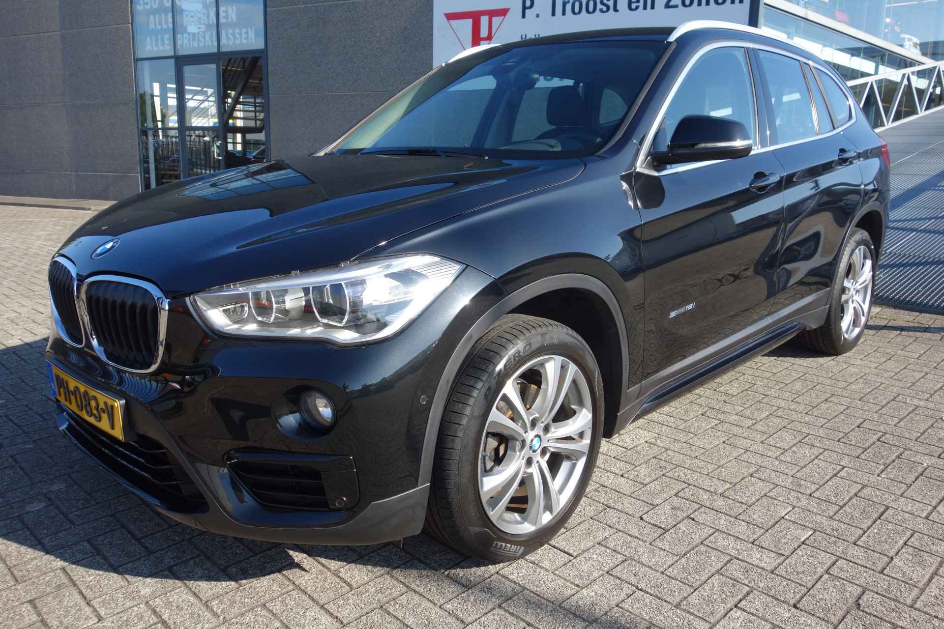 BMW X1 sDrive18i Executive AUTOMAAT/NAVIGATIE/CLIMATRONIC-AIRCO/L.M. VELGEN 18 INCH/PARKEER CAMERA & SENSOREN VOOR &ACHTER/BLEUTOOTH/CR - 12/28