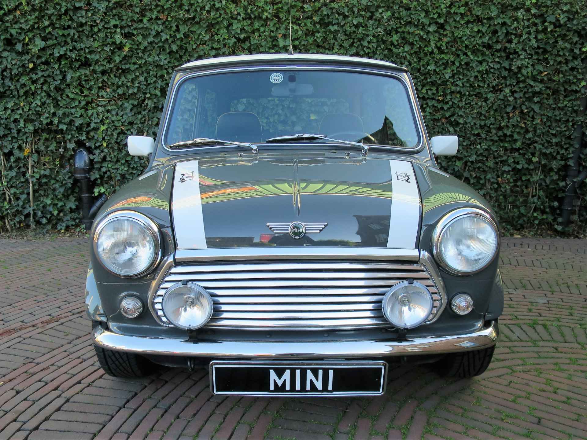 MINI Cooper 1.3 MPI NL-auto, met leder int., houten dash en 12" velgen - 29/38