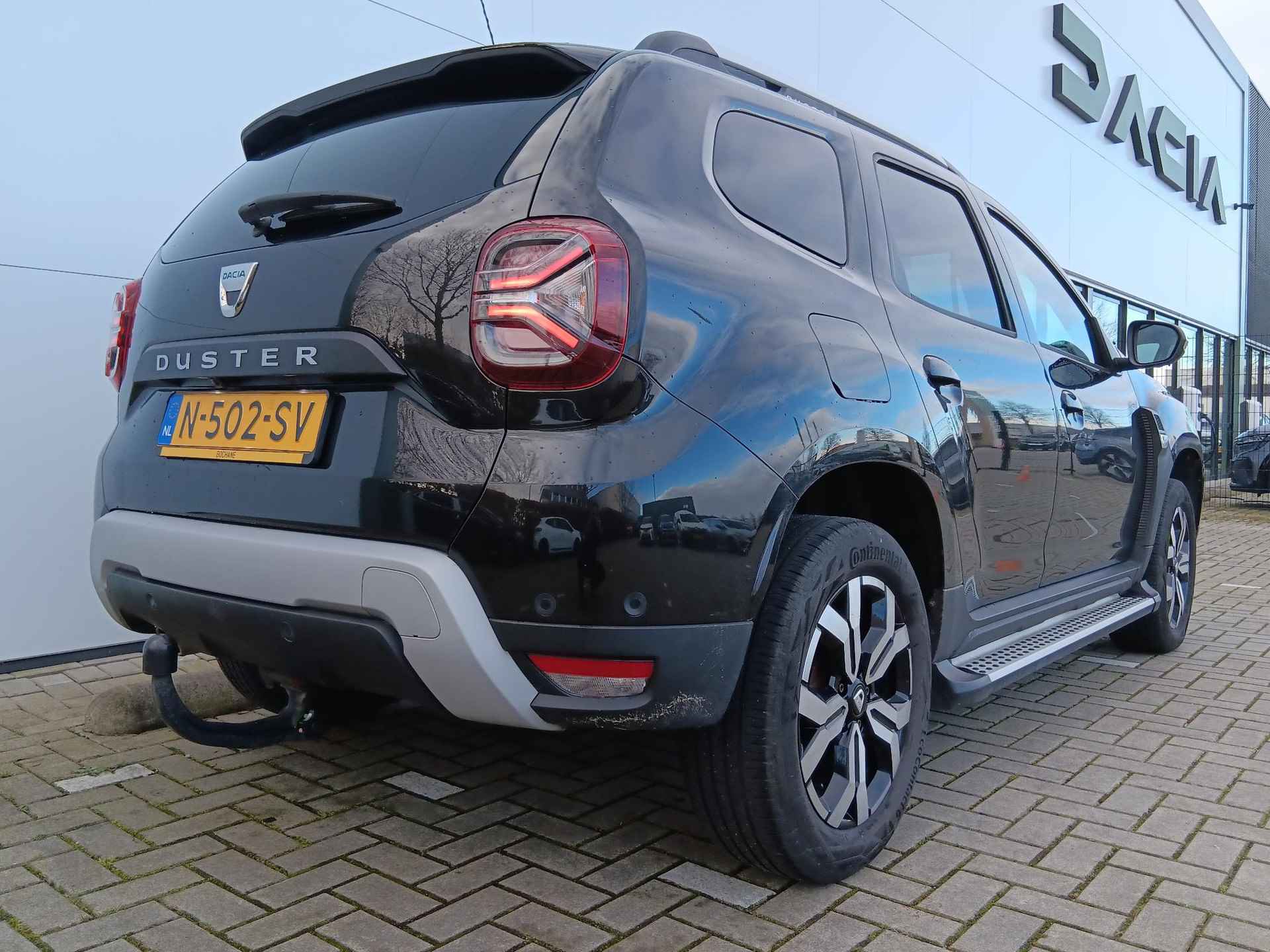 Dacia Duster 1.0 TCe 100 Bi-Fuel Prestige | Leder | 360° Rondomzichtcamera | Trekhaak | Sidesteps - 32/41