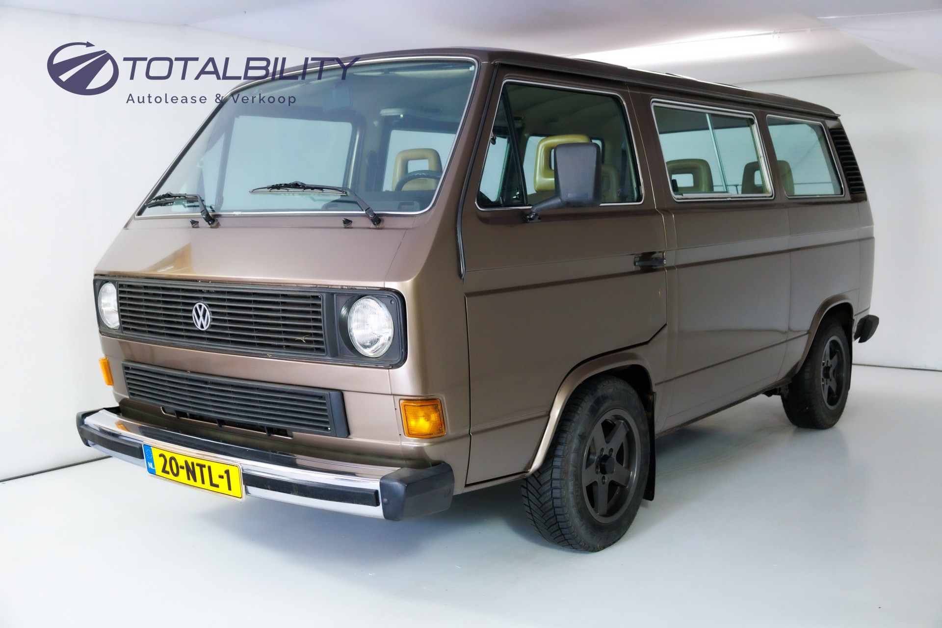 Volkswagen Caravelle T3 1.9i 66KW GL DE LUXE 7-persoons Luxe uitvoering met Open dak, Luxe stoelen, Ventilatie achterin, Armsteunen, Getint glas, uitklapbare instap