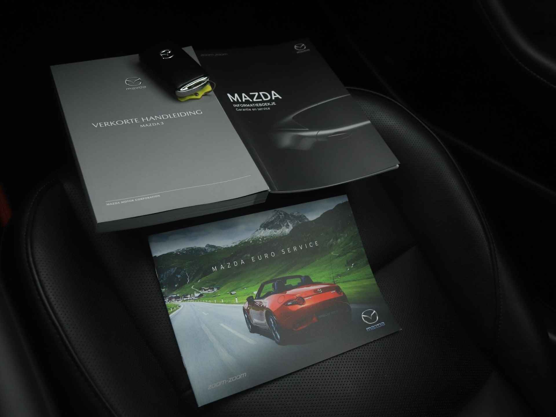 Mazda 3 2.0 SkyActiv-X Luxury i-Activesense automaat met vaste trekhaak : dealer onderhouden - 40/49
