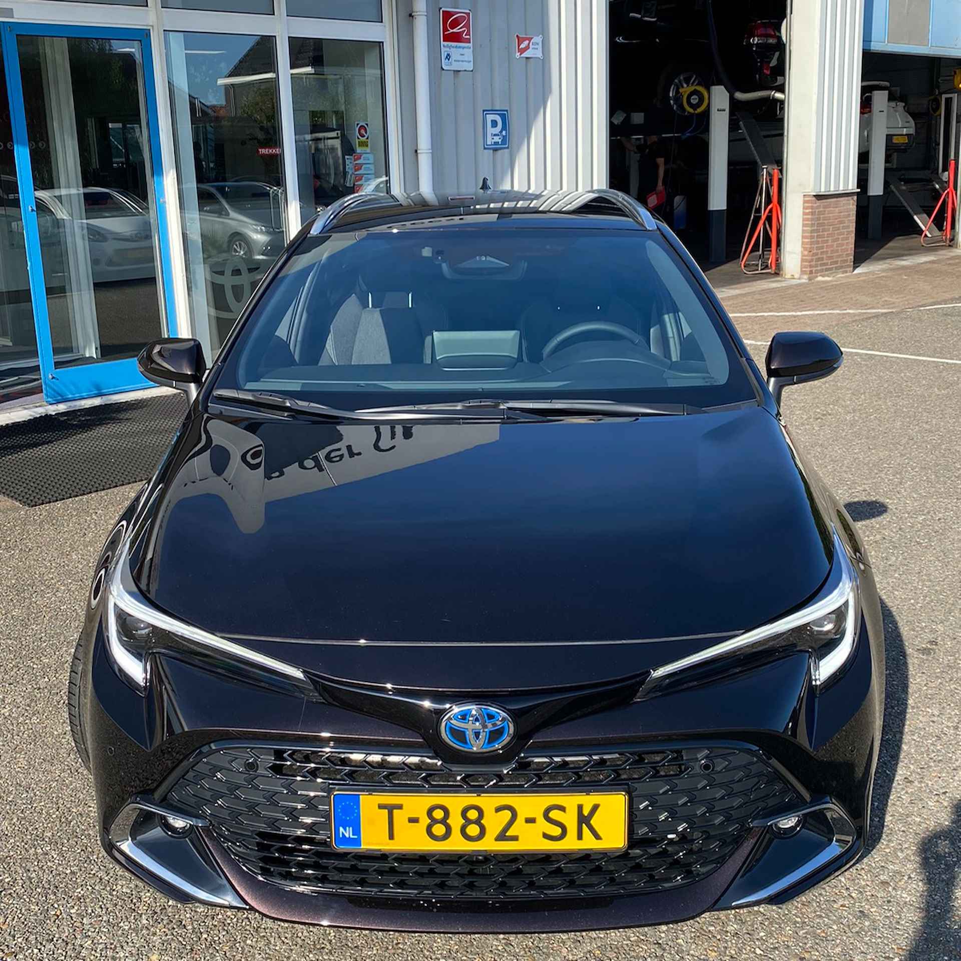 Toyota Corolla Touring Sports 2.0 High Power Hybrid First Edition - 29/30
